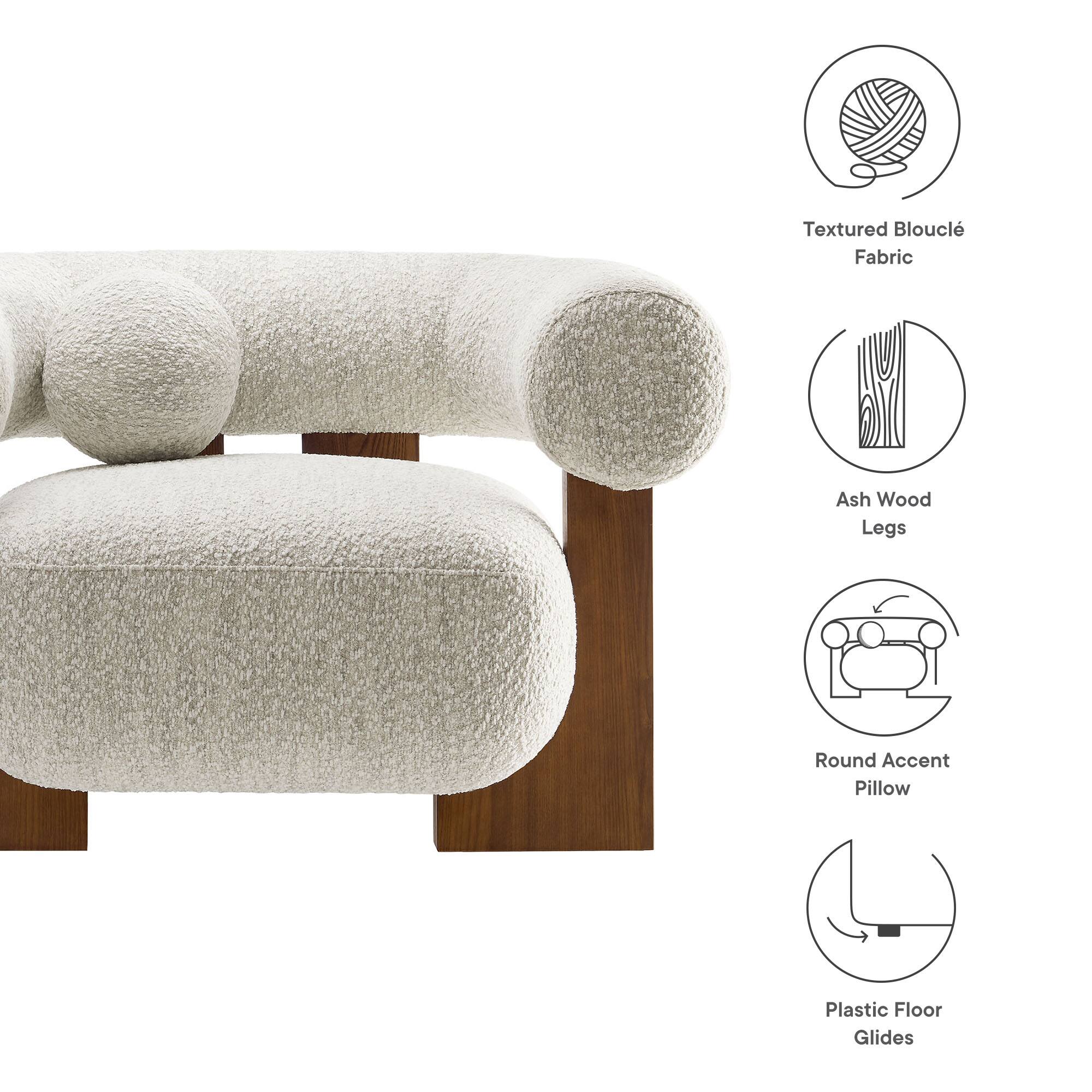 - Textured Bouclé Fabric
- Ash Wood Legs
- Round Accent Pillow
- Plastic Floor Glides