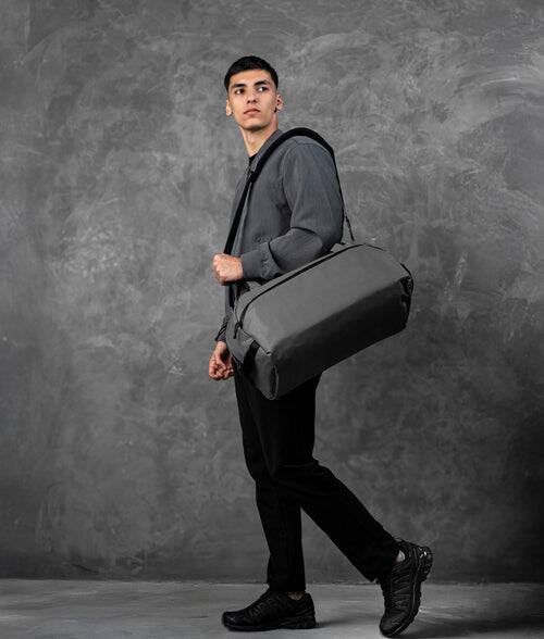 Alt View 10. ALPAKA - 35L Lightweight Duffel Bag for Gym, Weekend Trips & Carry-On Travel, Momentum Duffel, Weather-Resistant - Axodyne hybrid Grey.
