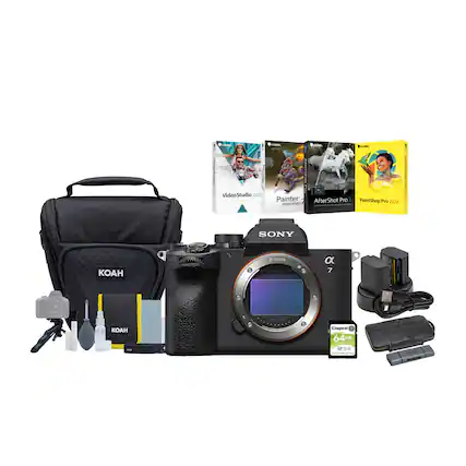 A Sony camera is displayed with its accessories, including a Kodak bag, a Sony book, and a Sony memory card. The camera is accompanied by a Sony charger, a Sony battery, and a Sony strap. The items are arranged neatly, showcasing the various components of the camera setup.