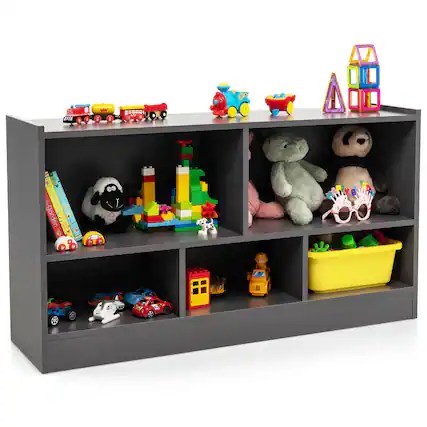 The image features a shelf with various toys, including a train, a teddy bear, and a car. There are also books on the shelf, adding to the variety of items displayed. The shelf is filled with different toys and items, creating a visually appealing and organized space for children to play and explore.