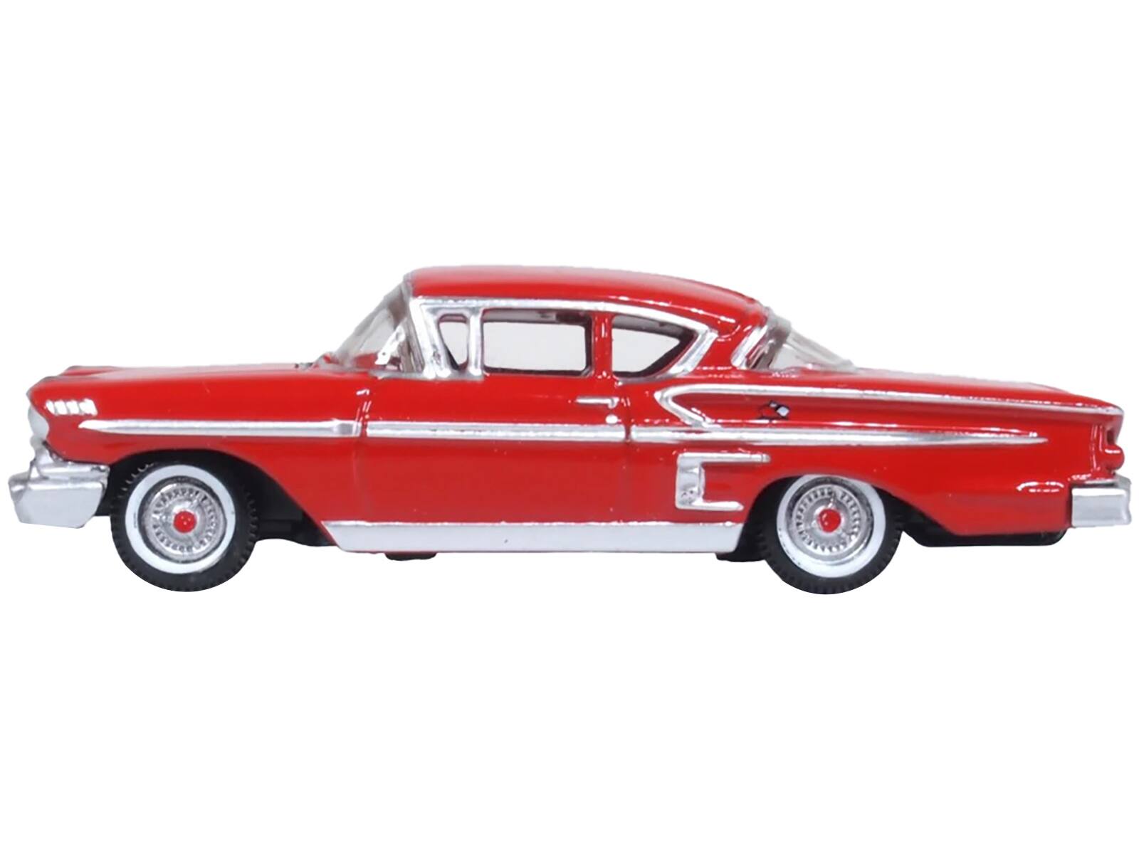 Angle. Oxford Diecast - 1958 Chevrolet Impala Sports Coupe Rio Red 1/87 (HO) Scale Diecast Model Car by Oxford Diecast - Red.