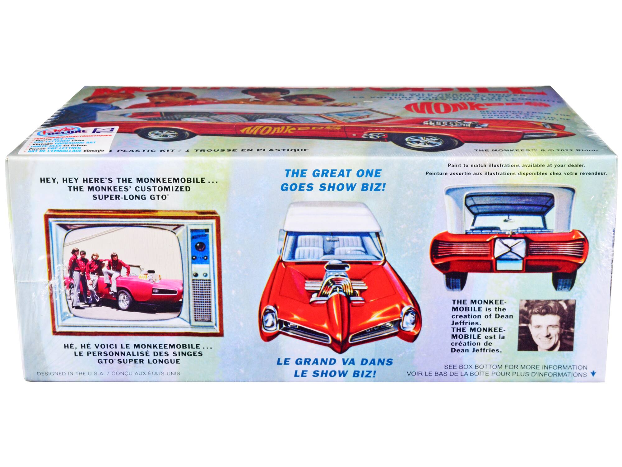 Sure, here is the corrected and grouped text from the image:

---

**Front Panel:**

- **Top Left:**
  - "HEY, HEY HERE'S THE MONKEEMOBILE... THE MONKEES' CUSTOMIZED SUPER-LONG GTO"
  - "Paint to match illustrations available at your dealer."
  - "Peinture assortie aux illustrations disponibles chez votre revendeur."

- **Top Right:**
  - "THE GREAT ONE GOES SHOW BIZ!"

- **Middle Left:**
  - "HÉ, HÉ VOICI LE MONKEEMOBILE... LE PERSONNALISÉ DES SINGES GTO SUPER LONGUE"
  - "DESIGNED IN THE U.S.A. / CONCU AUX ÉTATS-UNIS"

- **Middle Right:**
  - "LE GRAND VA DANS LE SHOW BIZ!"

- **Bottom Right:**
  - "THE MONKEE-MOBILE is the creation of Dean Jeffries."
  - "THE MONKEE-MOBILE est la création de Dean Jeffries."
  - "SEE BOX BOTTOM FOR MORE INFORMATION"
  - "VOIR LE BAS DE LA BOITE POUR PLUS D'INFORMATIONS"

- **Bottom