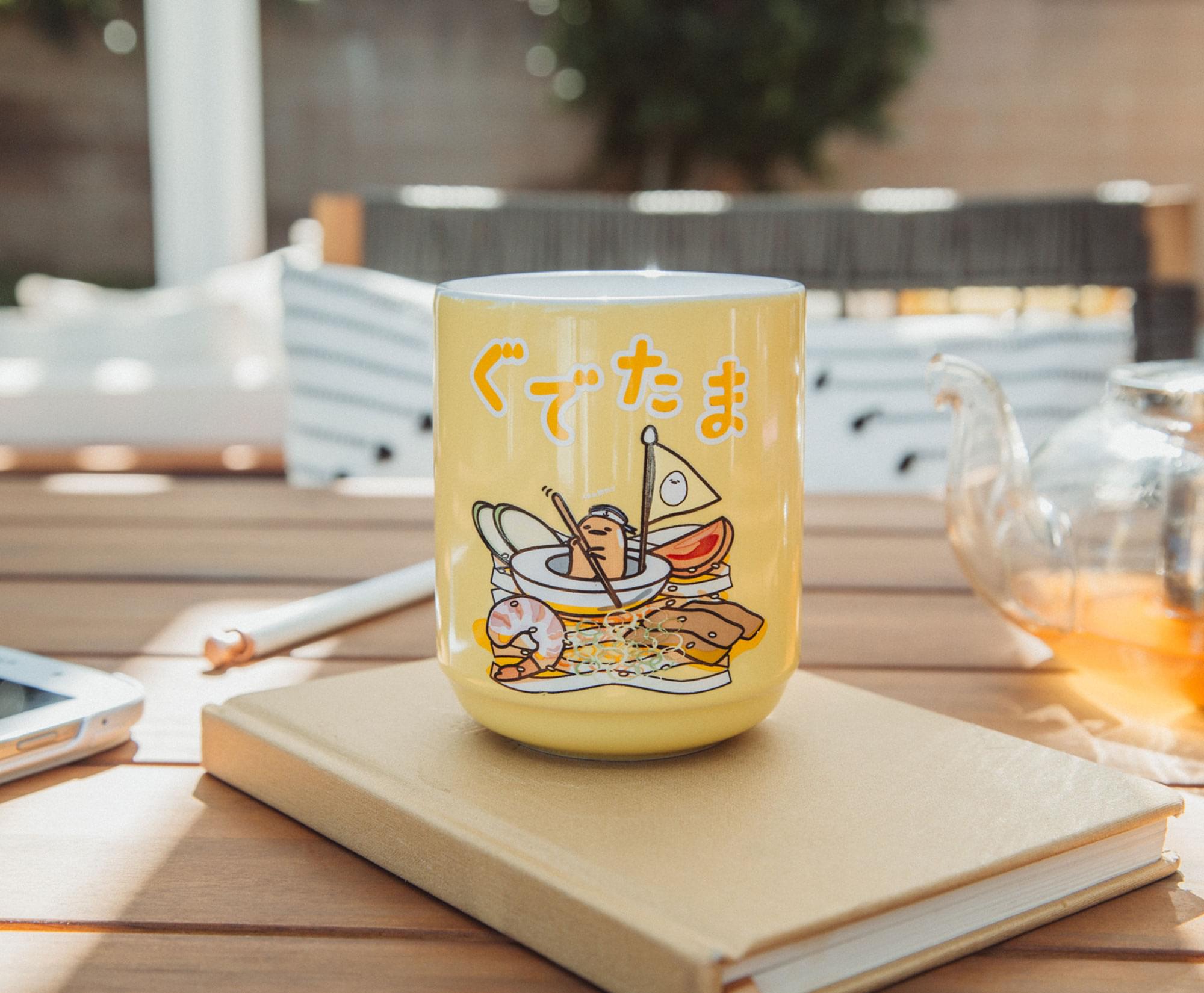 Alt View 4. Silver Buffalo - Sanrio Gudetama Sailing On Ramen Asian Ceramic Tea Cup | Holds 9 Ounces - Yellow.