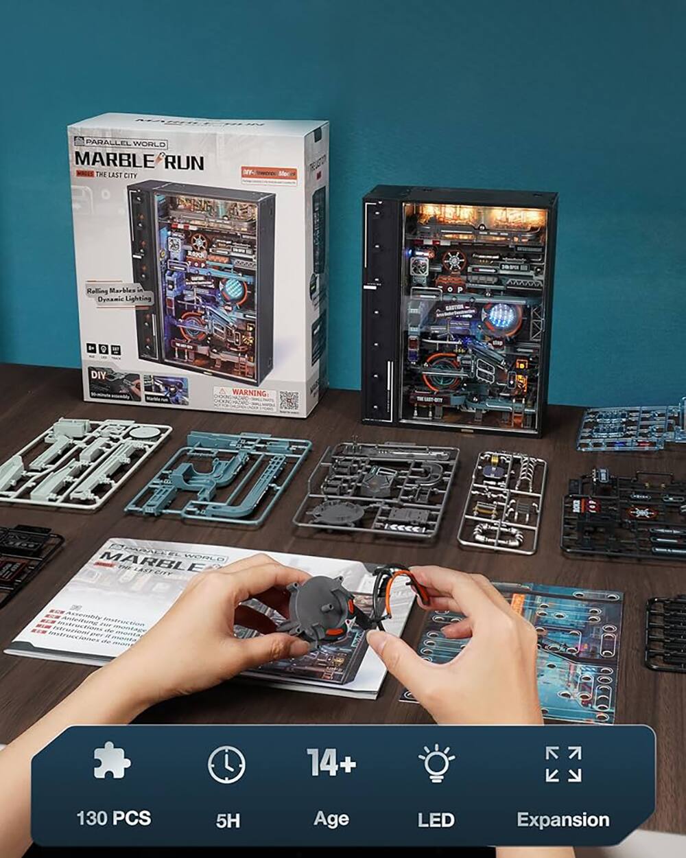 PARALLEL WORLD MARBLE RUN  
THE LAST CITY  

Rolling Marbles in Dynamic Lighting  

DIY  
WARNING  

130 PCS  
5H  
Age 14+  
LED Expansion