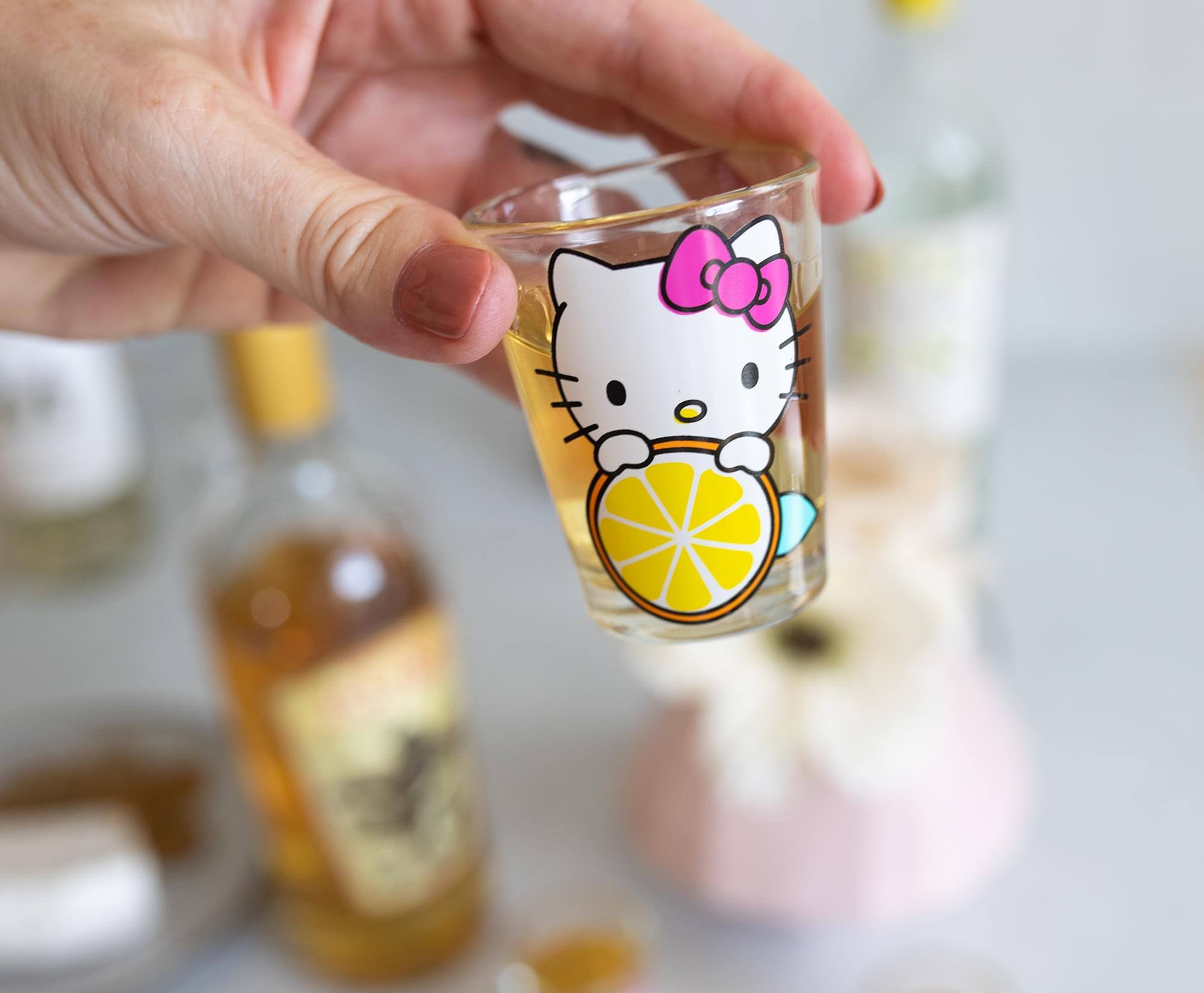 Alt View 3. Silver Buffalo - Hello Kitty 1.5-Ounce Mini Shot Glasses | Set of 4 - Purple.