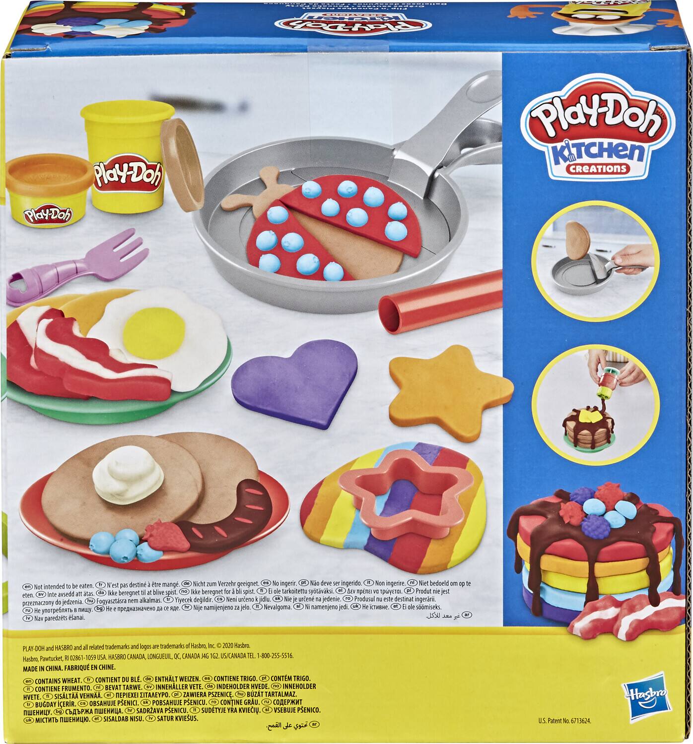 The text on the image is:

"Play-Doh Kitchen Creations

Not intended to eat. No destinado para comer. Nicht zum essen bestimmt. Non destiné à être mangé. Non ingedir. Net bedoeld om te eten. Non destiné à être mangé. Non ingedir. Net bedoeld om te eten. Non destiné à être mangé. Non ingedir. Net bedoeld om te eten. Non destiné à être mangé. Non ingedir. Net bedoeld om te eten. Non destiné à être mangé. Non ingedir. Net bedoeld om te eten. Non destiné à être mangé. Non ingedir. Net bedoeld om te eten. Non destiné à être mangé. Non ingedir. Net bedoeld om te eten. Non destiné à être mangé. Non ingedir. Net bedoeld om te eten. Non destiné à être mangé. Non ingedir. Net bedoeld om te eten. Non destiné à être mangé. Non ingedir. Net bedoeld om te eten. Non destiné à être mangé. Non ingedir. Net bedoeld om te eten. Non destiné à être mangé. Non ingedir. Net bedoeld om te eten. Non destiné à être mangé. Non ingedir. Net bedoeld om te eten. Non destiné à être mangé. Non ingedir. Net bedoeld om te eten. Non destiné à être mangé. Non ingedir. Net bedoeld om te eten. Non destiné à être mangé. Non ingedir. Net bedoeld om te eten. Non destiné à être mangé. Non ingedir. Net bedoeld om te eten. Non destiné à être mangé. Non ingedir. Net bedoeld om te eten. Non destiné à être mangé. Non ingedir. Net bedoeld om te eten. Non destiné à être mangé. Non ingedir. Net bedoeld om te eten. Non destiné à être mangé. Non ingedir. Net bedoeld om te eten. Non destiné à être mangé. Non ingedir. Net bedoeld