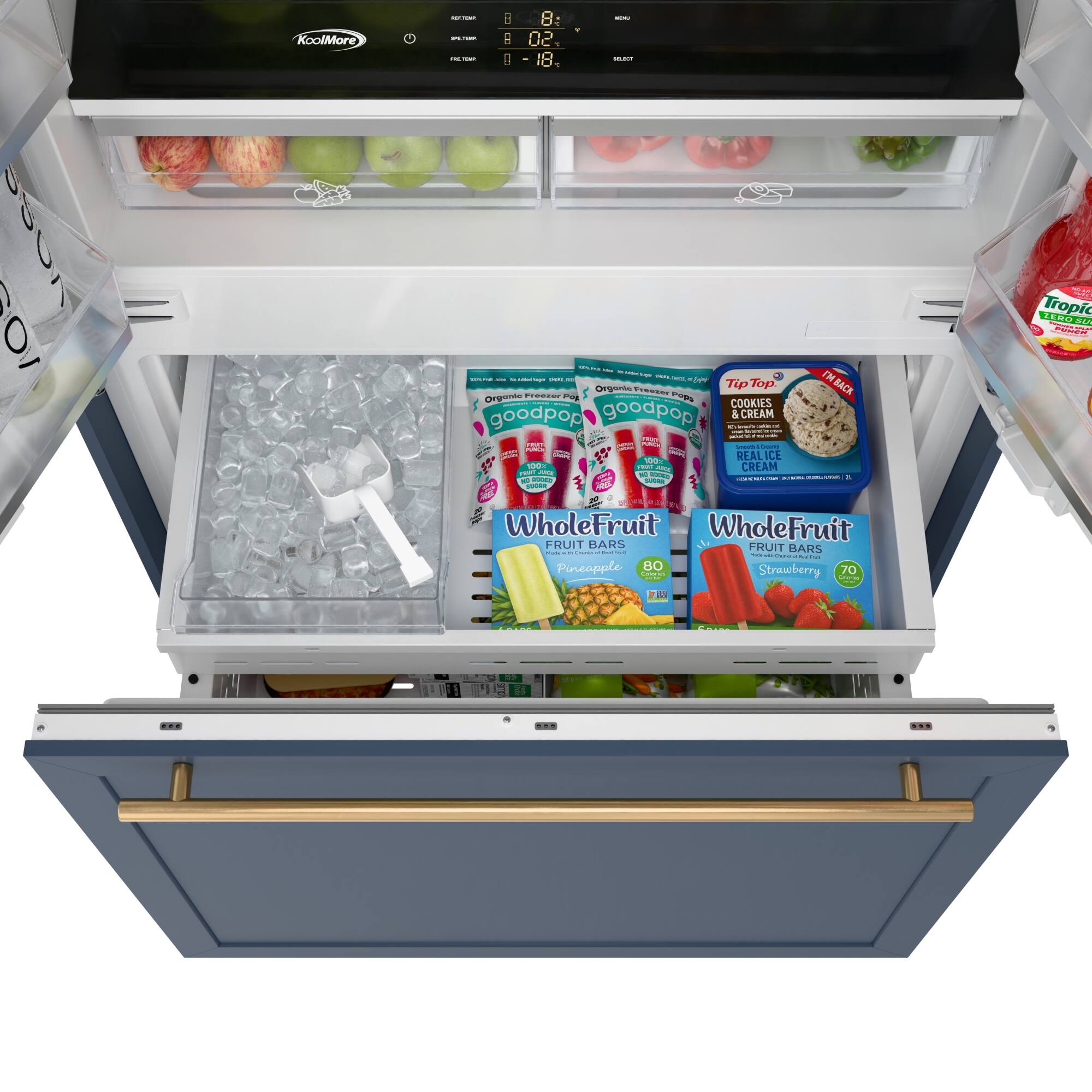 The image shows a refrigerator with its door open, revealing a variety of food items. Inside the refrigerator, there are several apples, oranges, and a bottle of juice. Additionally, there are three packages of cookies and a package of cream. The refrigerator also contains a bowl and a spoon, which are placed on the shelf. The contents of the refrigerator are organized neatly, making it an inviting and functional space for storing and preparing food.
