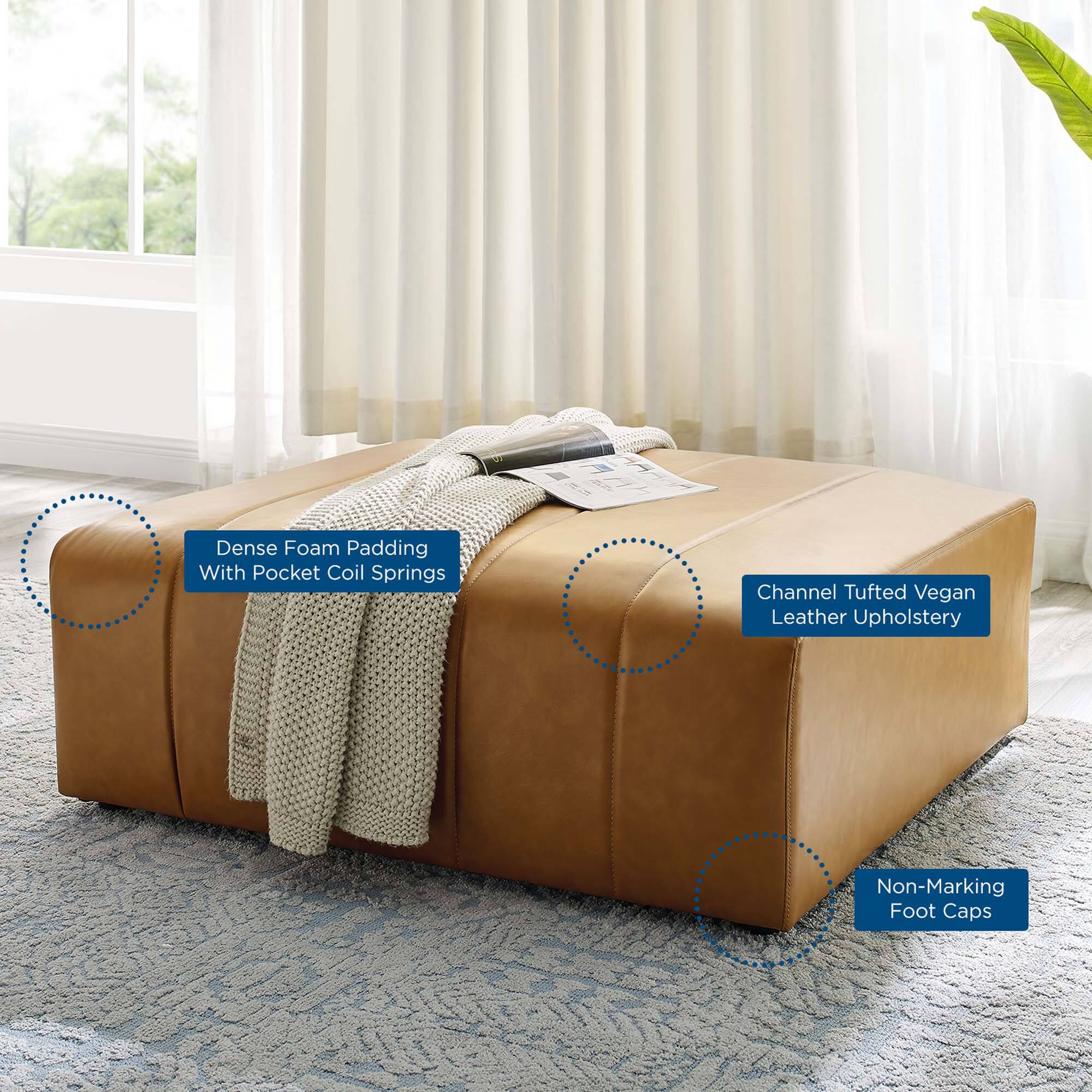 Dense Foam Padding With Pocket Coil Springs  
Channel Tufted Vegan Leather Upholstery  
Non-Marking Foot Caps