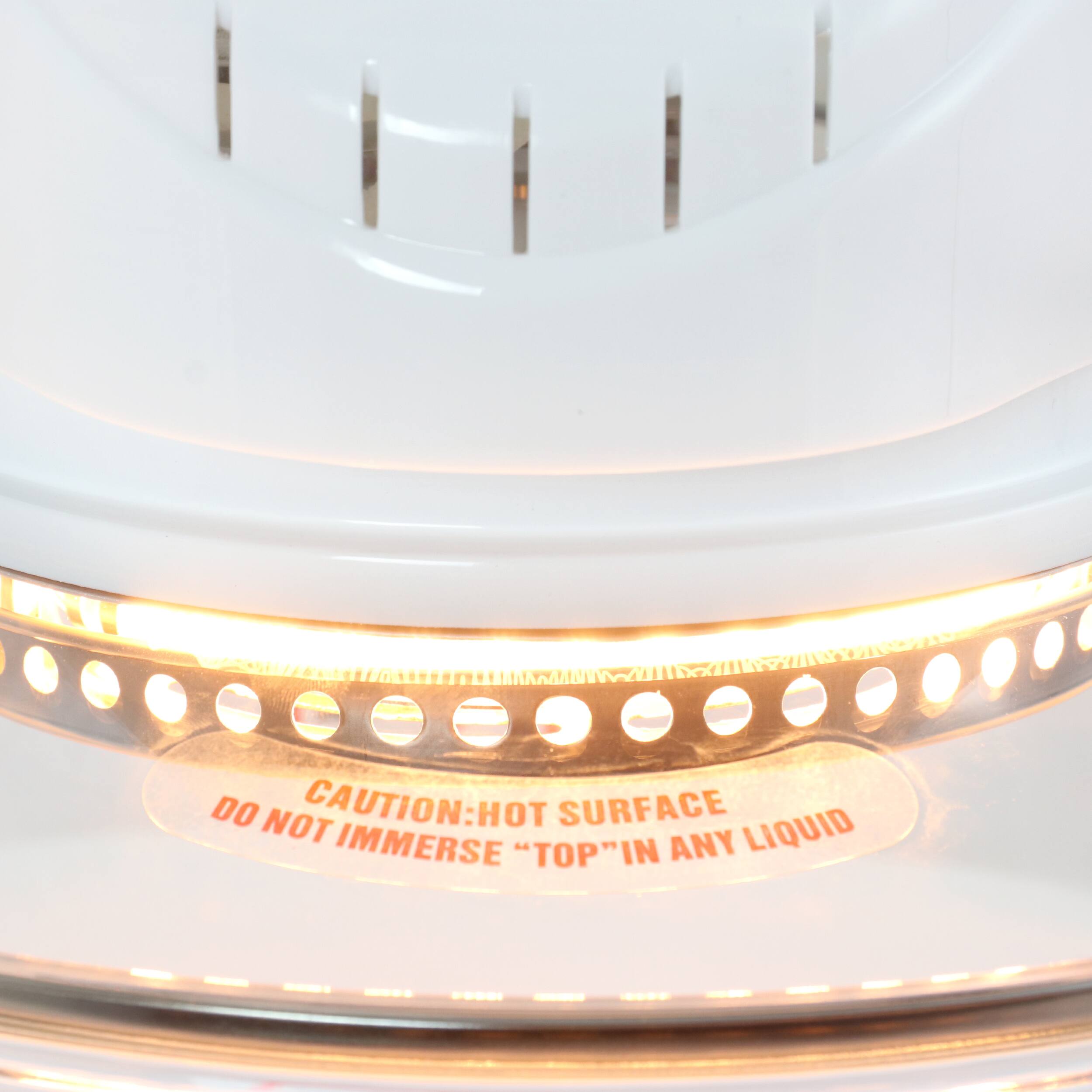 CAUTION: HOT SURFACE
DO NOT IMMERSE "TOP" IN ANY LIQUID