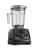 The image shows a Vitamix blender with a black base and a clear container. The blender is turned on and has the time 0:45 displayed on the screen. The blender is sitting on a counter, and there is a spoon inside it.