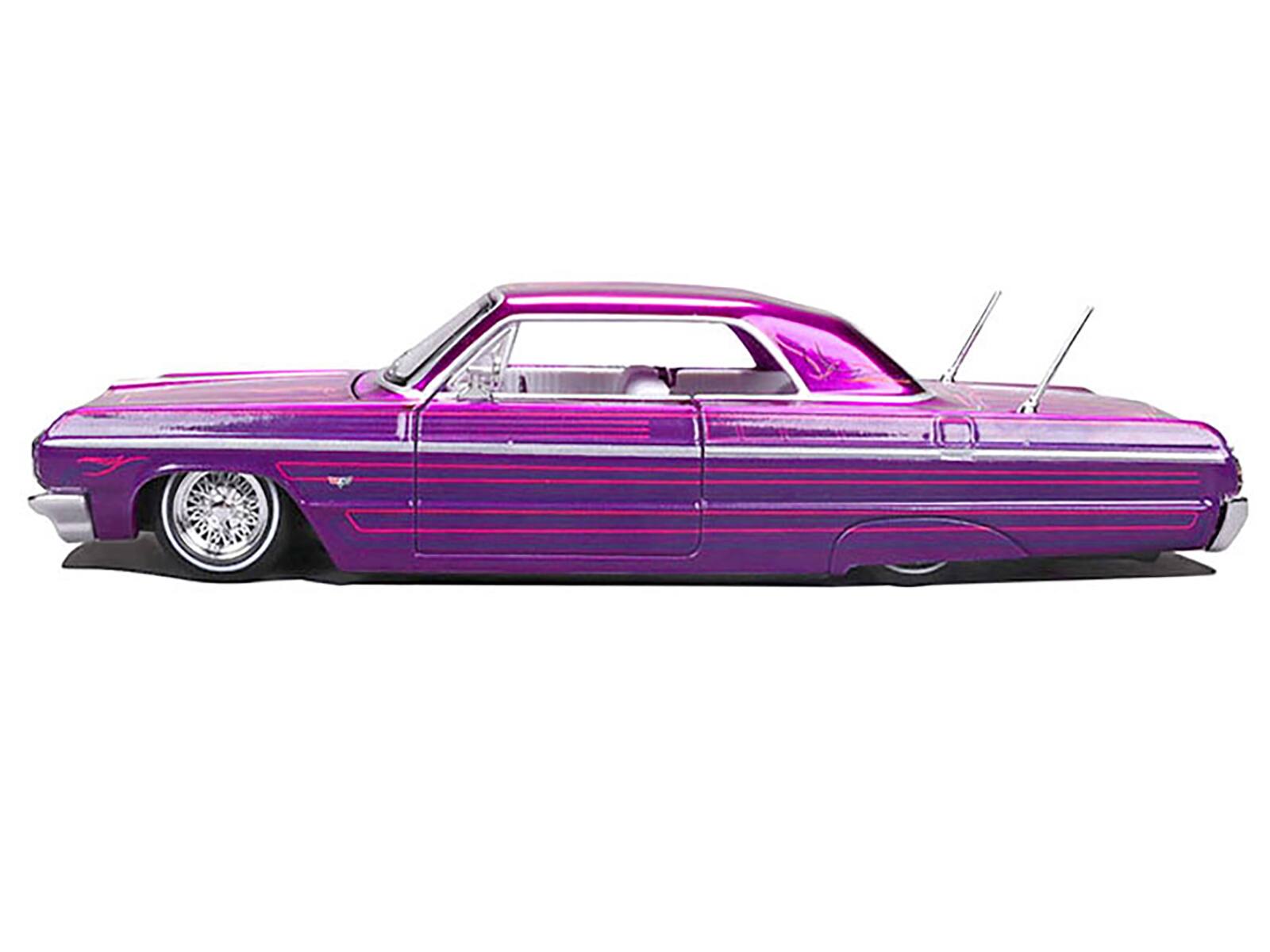 Alt View 2. Maisto - 1964 Chevrolet Impala SS Lowrider Candy Purple with Graphics and White Interior "Lowriders" 1/26 Model Car by Maisto.