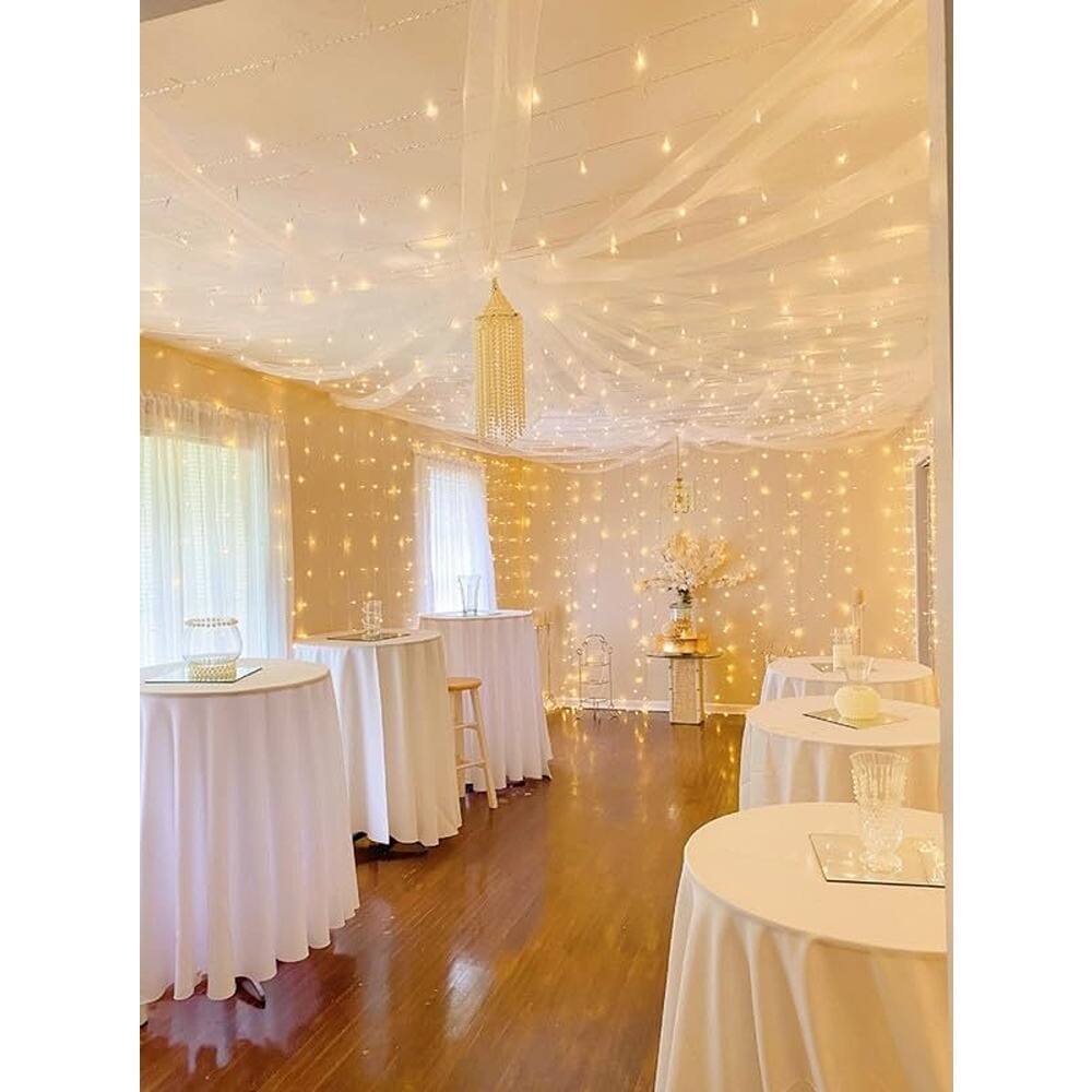 Left. MOSZAR LLC - Curtain Lights, 594 LED, 20×10 ft, Plug-In, Twinkle Fairy String.