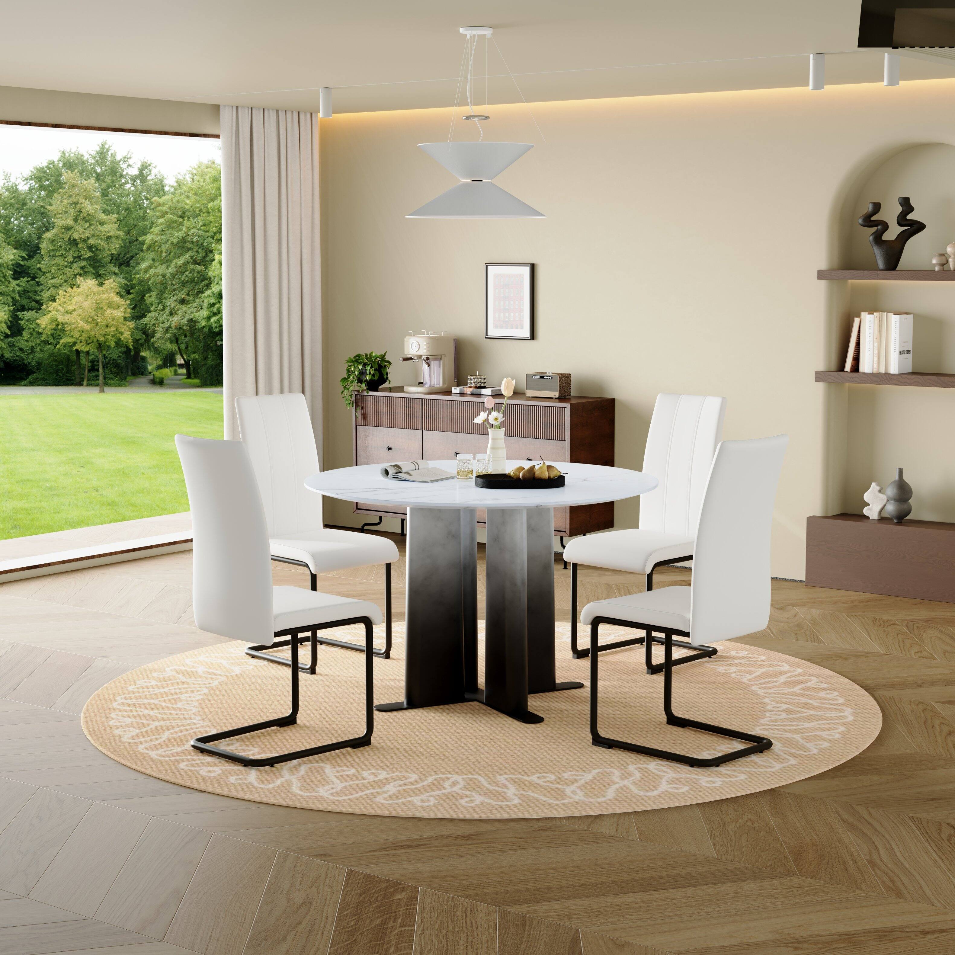 Alt View 2. Loheer - Loheer- 3.94ft Round Faux Marble Dining Table Modern Compact Kitchen Table with Cross Base for Small Spaces - White.