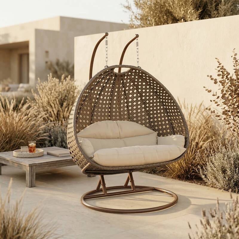 Angle. LeisureMod - Leisuremod 2-Person Wicker Egg Swing Chair with Stand & Washable Cushions - Indoor/Outdoor Double Hanging Patio Chair - Cream.
