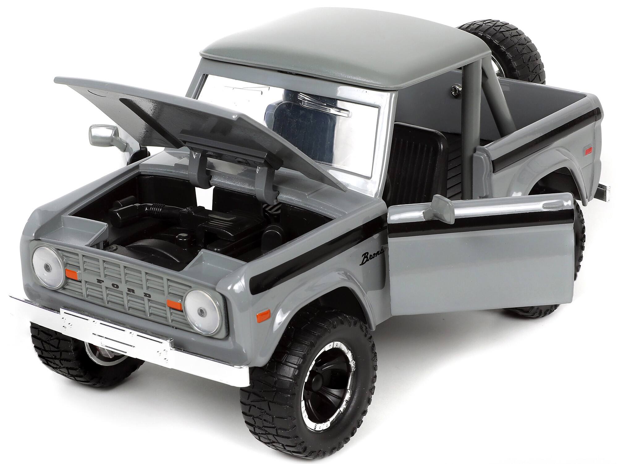 Alt View 1. Jada - 1973 Ford Bronco Pickup Truck Gray with Black Stripes with Extra Wheels "Just Trucks" Series 1/24 Model Car by Jada.