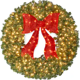Best Choice Products - 24in Artificial Pre-Lit Fir Christmas Wreath Decor w/ Red Bow, 70 LED Lights, 100 Tips, Battery - Green Spruce