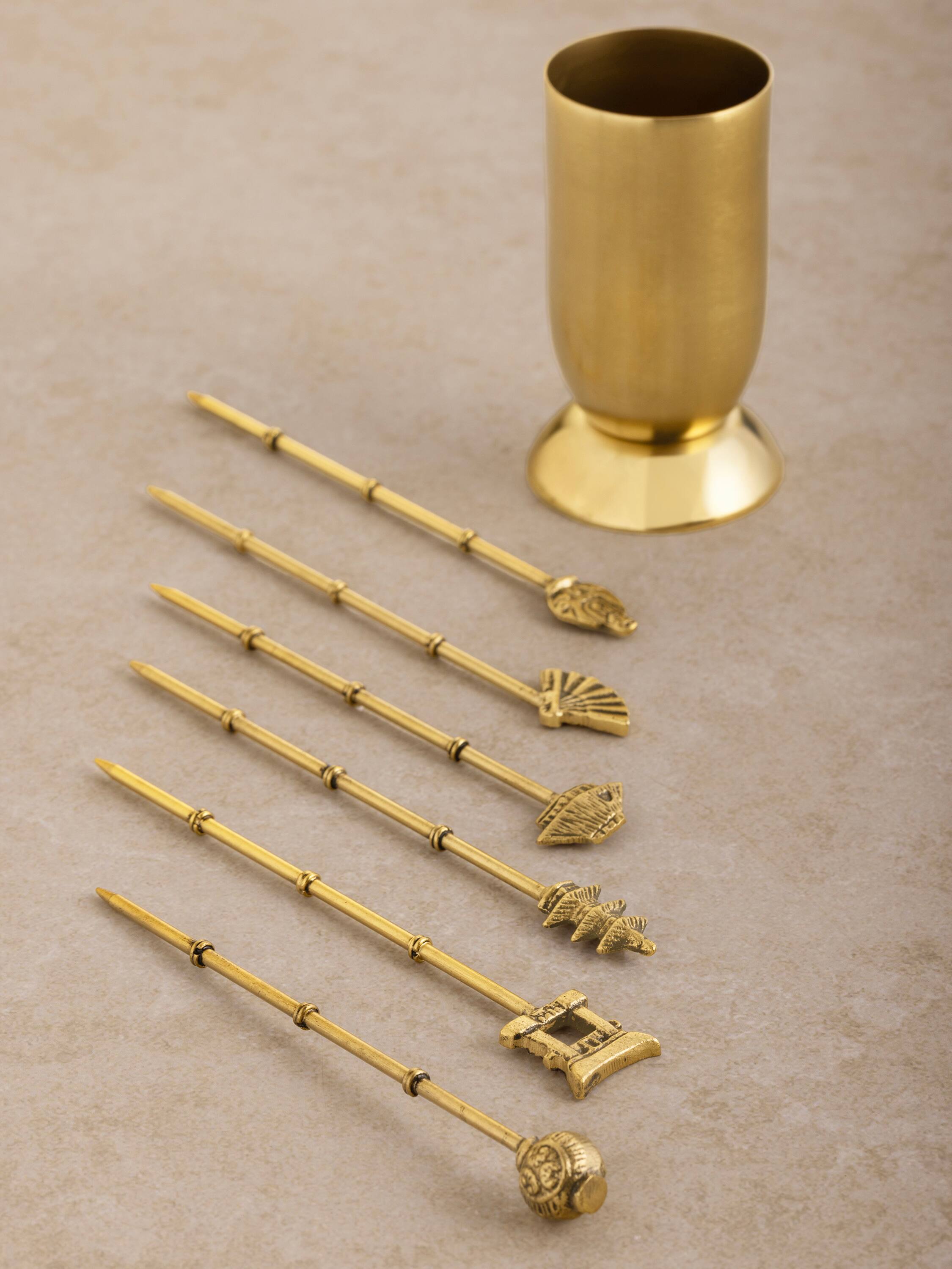 Left. GAURI KOHLI - Magnolia Cocktail Picks - Antique matte gold.