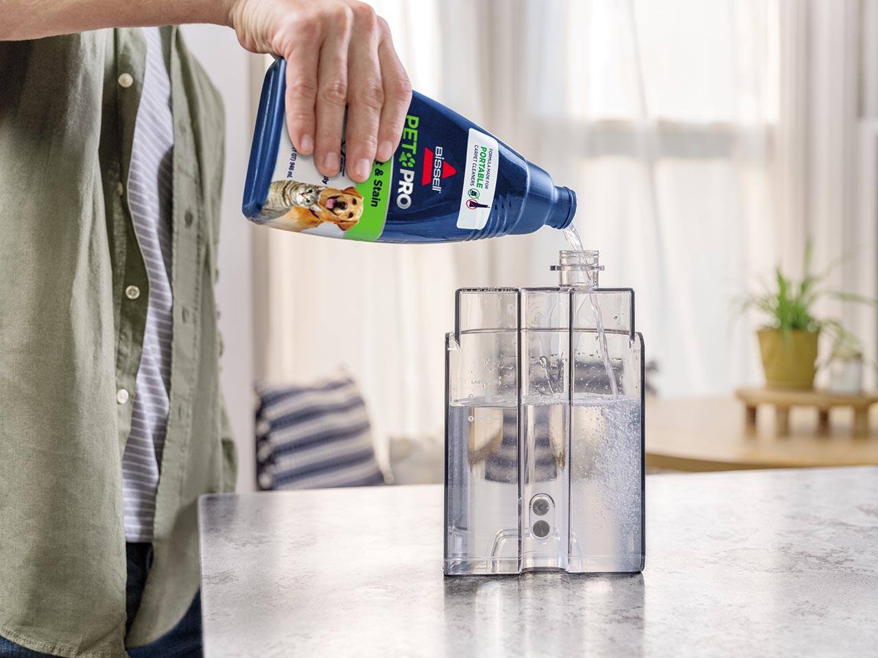 E.g. I A PET Stain & Odor PRO BISSELL FORMULA CLEANERS PORTABLE E na a MADE