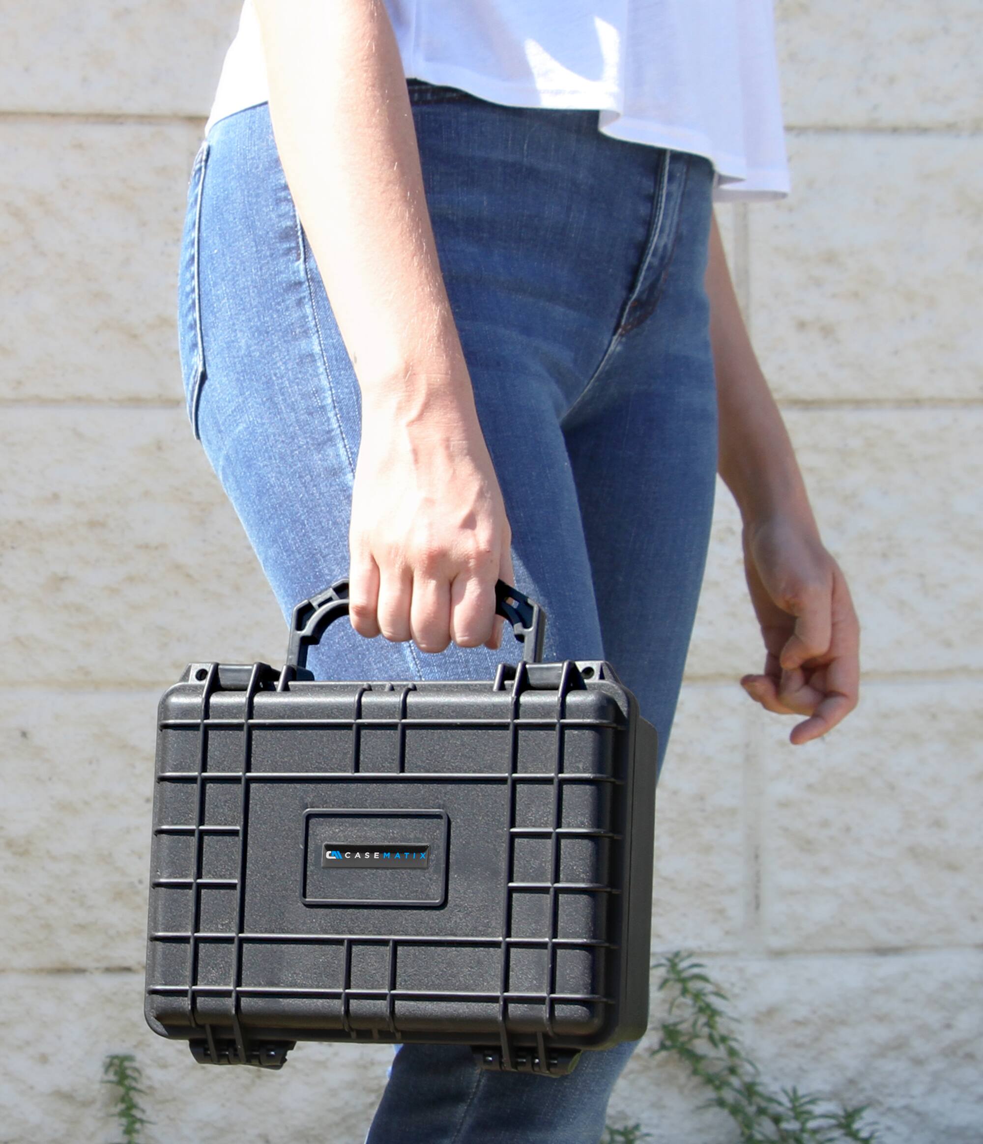 Angle. CASEMATIX - 9" Waterproof Hard Case w/ Customizable Foam – Rugged Travel Storage for Electronics, Tools, Accessories & Collectibles.