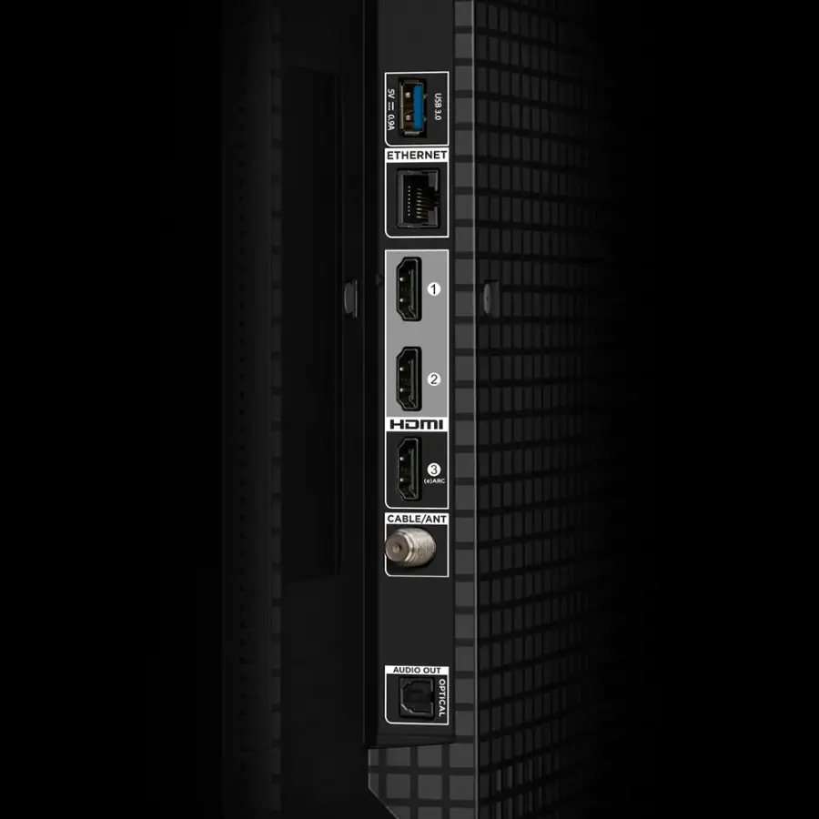 The text on the image reads: "5V SV=0.9A I USB 3.0 VID ETHERNET 1 2 HOMI 3 TARC CABLE/ANT ANT AUDIO OUT OPTICAL." This text describes the features and ports available on the back of the device. The ports include USB 3.0, Ethernet, and various audio and video connections. The device is likely a computer or gaming console with multiple connectivity options.
