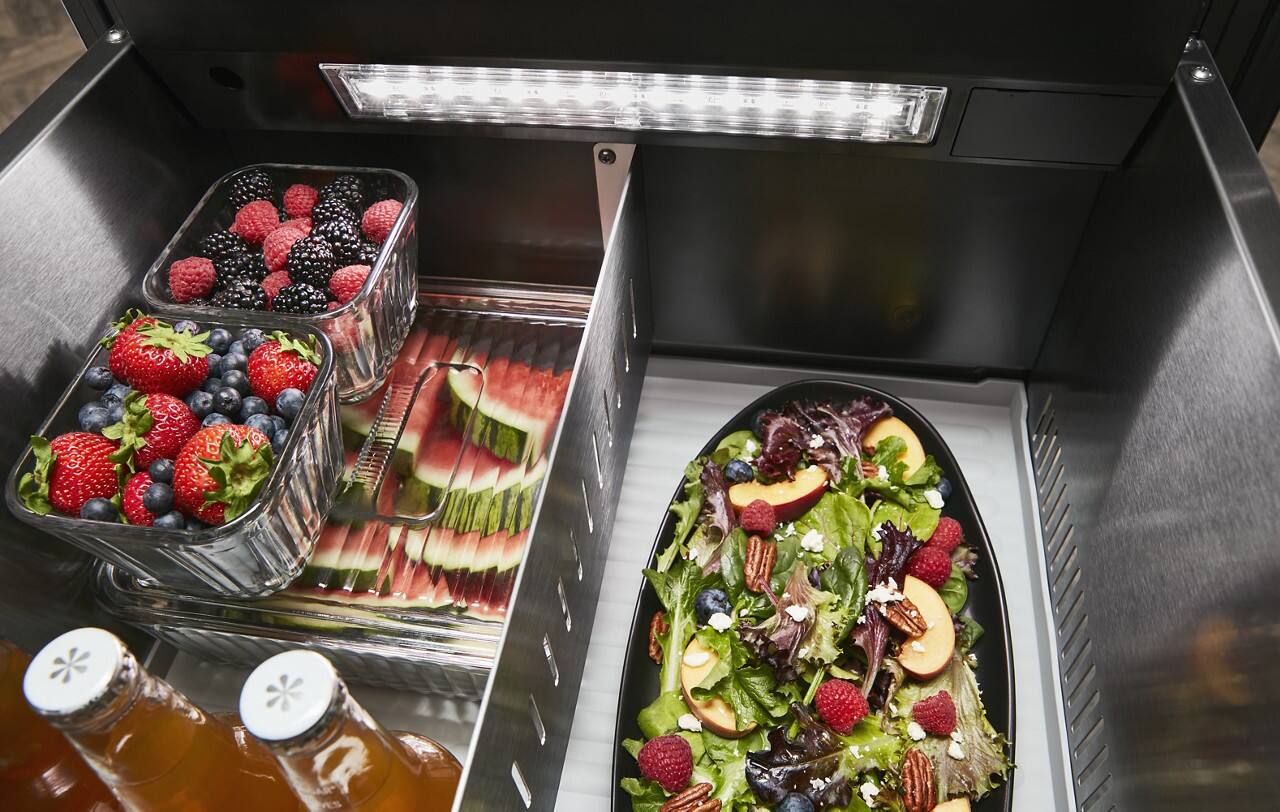 Angle. KitchenAid - 4.29 Cu. Ft. Built-In Mini Fridge with Double-Drawer Refrigerator/Freezer - Stainless Steel.