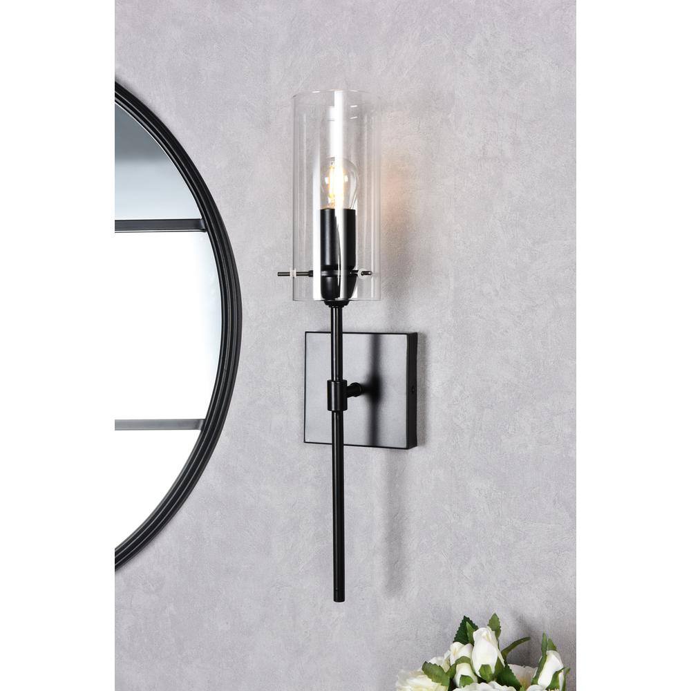 Angle. Living District - Elsreth 1 light black wall sconce - Black And Clear.