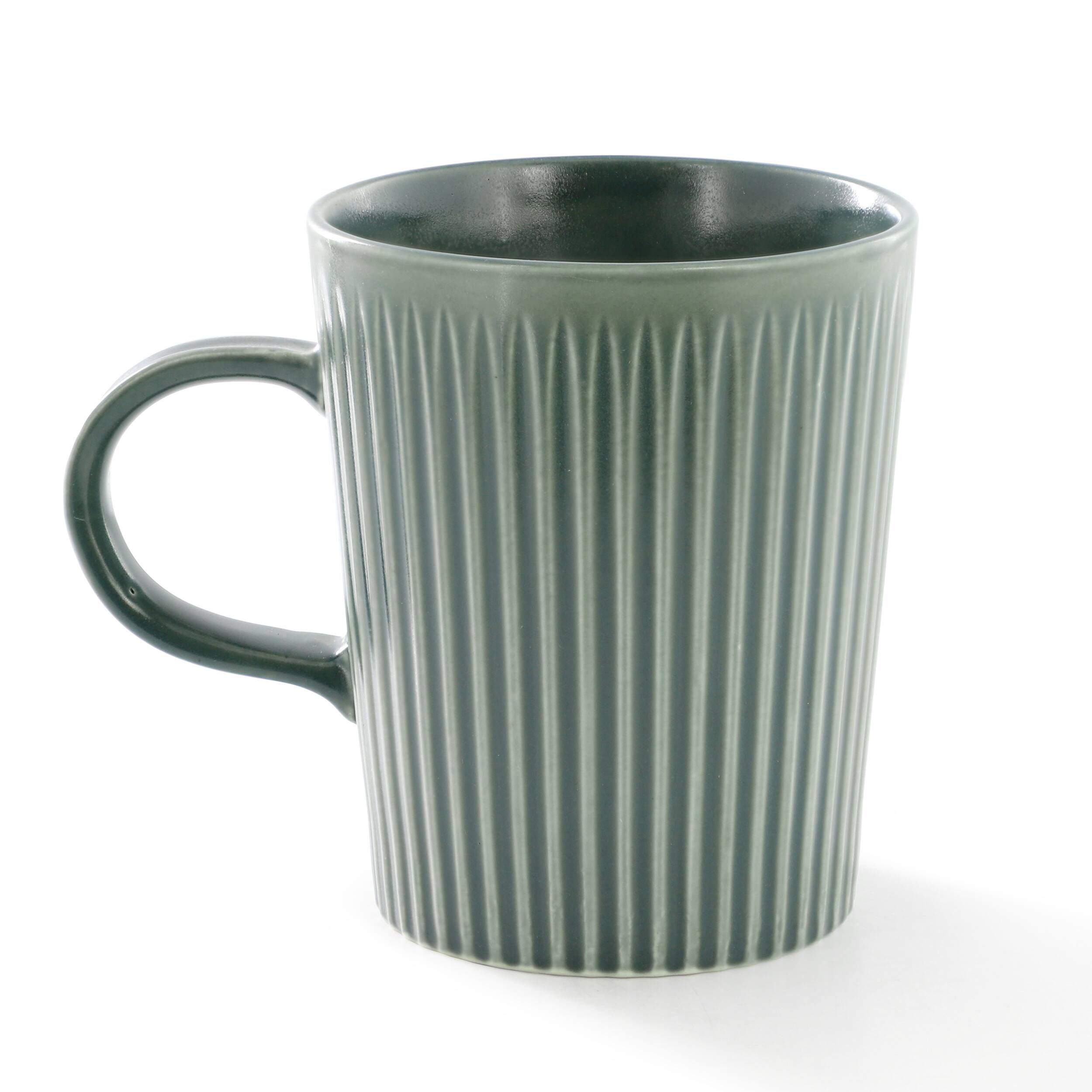 Angle. Meritage - Meritage 4 Piece 16.5 Ounce Embossed Stoneware Mug Set in Matte Sage - Sage.