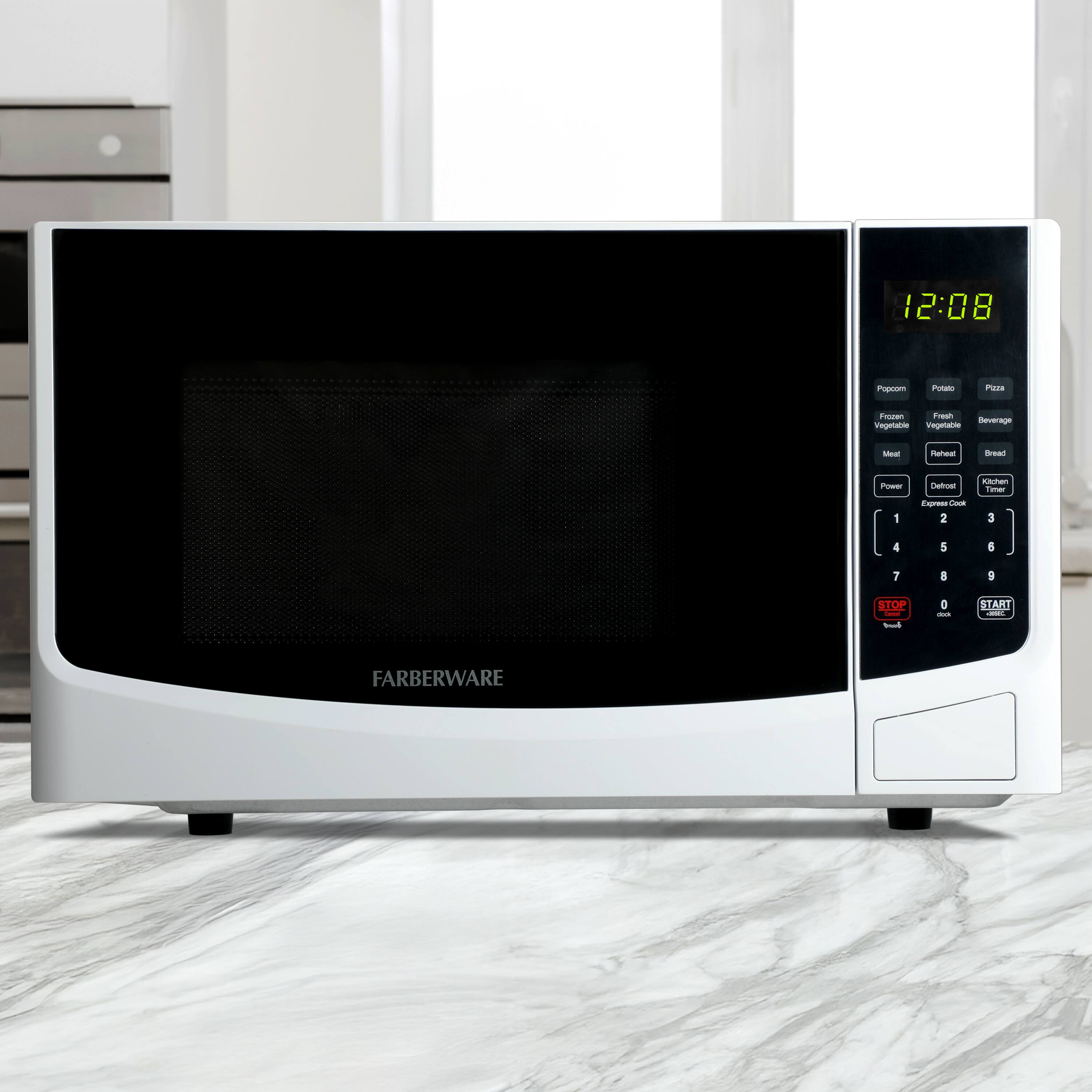 12:08  
Popcorn  
Potato  
Pizza  
Frozen Vegetable  
Fresh Vegetable  
Beverage  
Meat  
Reheat  
Bread  
Power  
Defrost  
Kitchen  
Express Cook  
1 2 3 4 5 6 7 8 9 0  
STOP  
START  
FARBERWARE