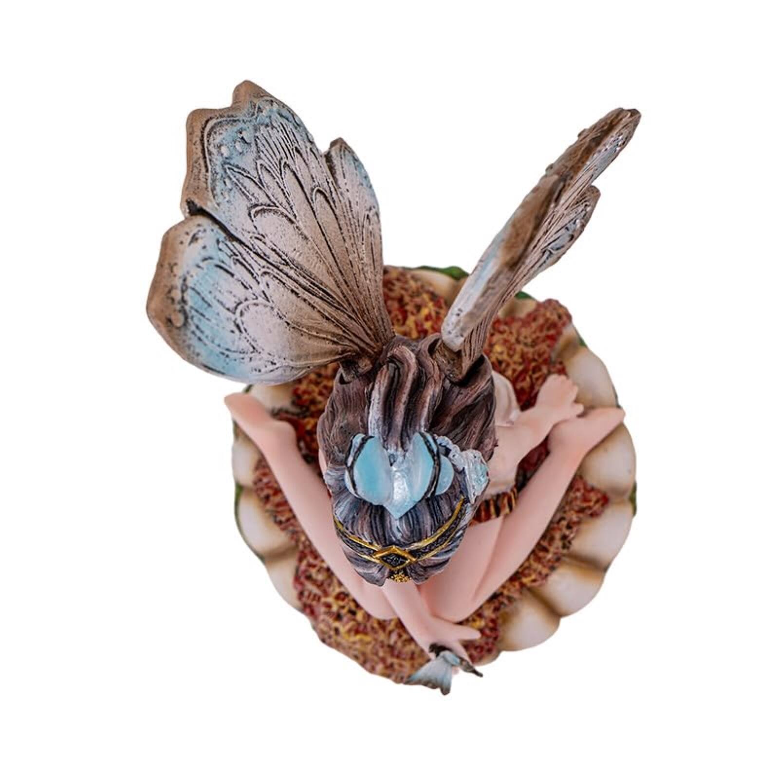 Left. Pacific Trading - Butterfly Fairy on Mushroom Statue 8.27 inch Fantasy Figurine with Delicate Wings and Butterfly Details.