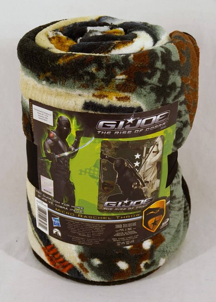 Sure, here is the corrected and grouped text from the image:

---

**G.I. JOE: The Rise of Cobra**

**Visit G.I.JOE.COM for more the rise of cobra items!**

**Micro Raschel Throw**

**100% Acrylic**

**12 oz. (340 g) 1000 yds. (914 m)**

**Made in China**

**Care: Machine wash cold, gentle cycle. Tumble dry low. Do not bleach. Do not iron.**

**Warning: Choking Hazard - Small parts. Not for children under 3 years.**

**The Hasbro Company LLC**
**Hasbro, Inc.**
**One Hasbro Way**
**Pawtucket, RI 02861-9901**
**www.hasbro.com**

**© 2009 Hasbro, Inc. All Rights Reserved.**

**G.I. JOE and all related characters and elements are trademarks of Hasbro and/or its affiliates. © 2009 Hasbro. All Rights Reserved.**

**Manufactured by:**
**The Hasbro Company LLC**
**One Hasbro Way**
**Pawtucket, RI