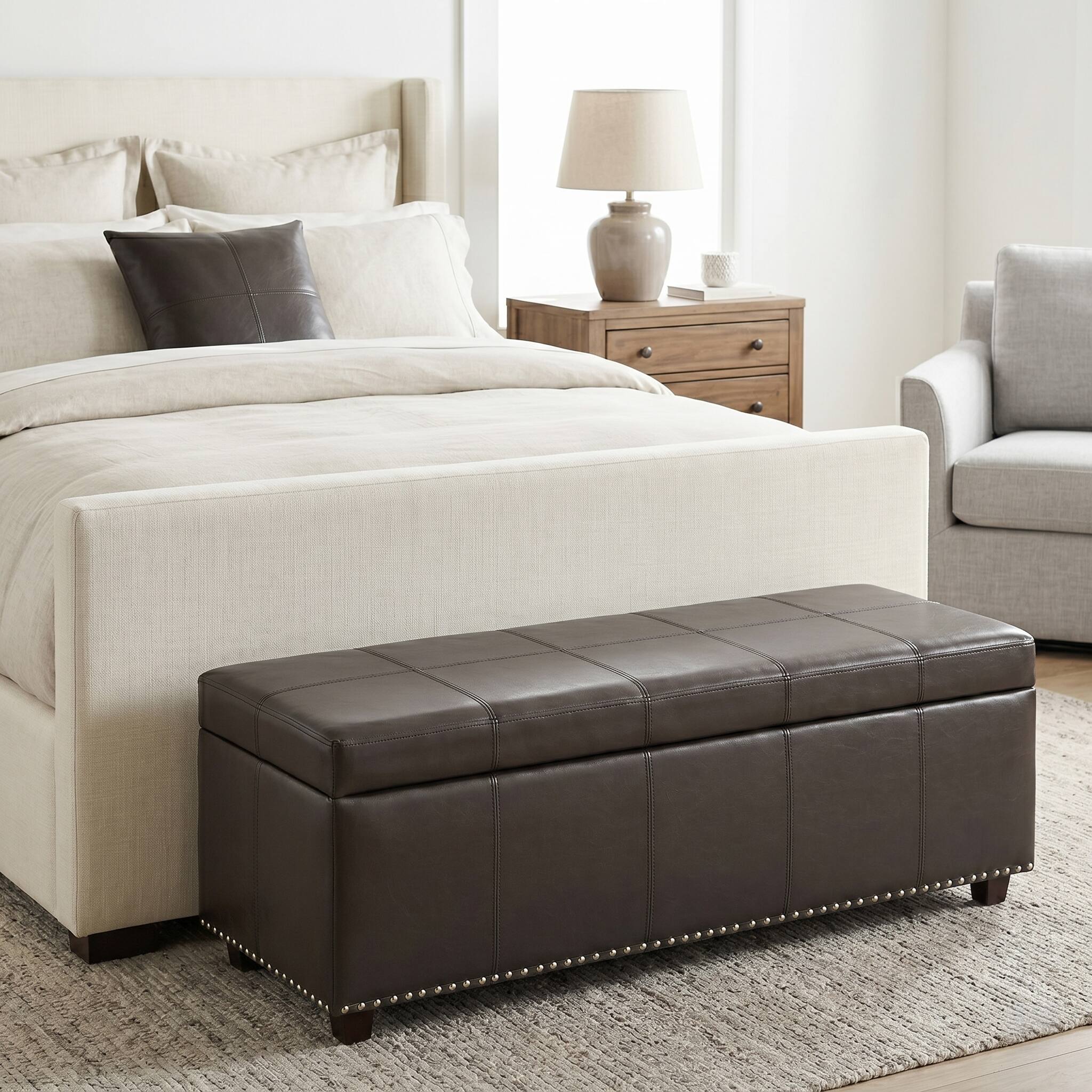 Angle. Simpli Home - Kingsley 48 inch Wide Large Storage Ottoman in Coffee Brown Vegan Leather - Coffee Brown.