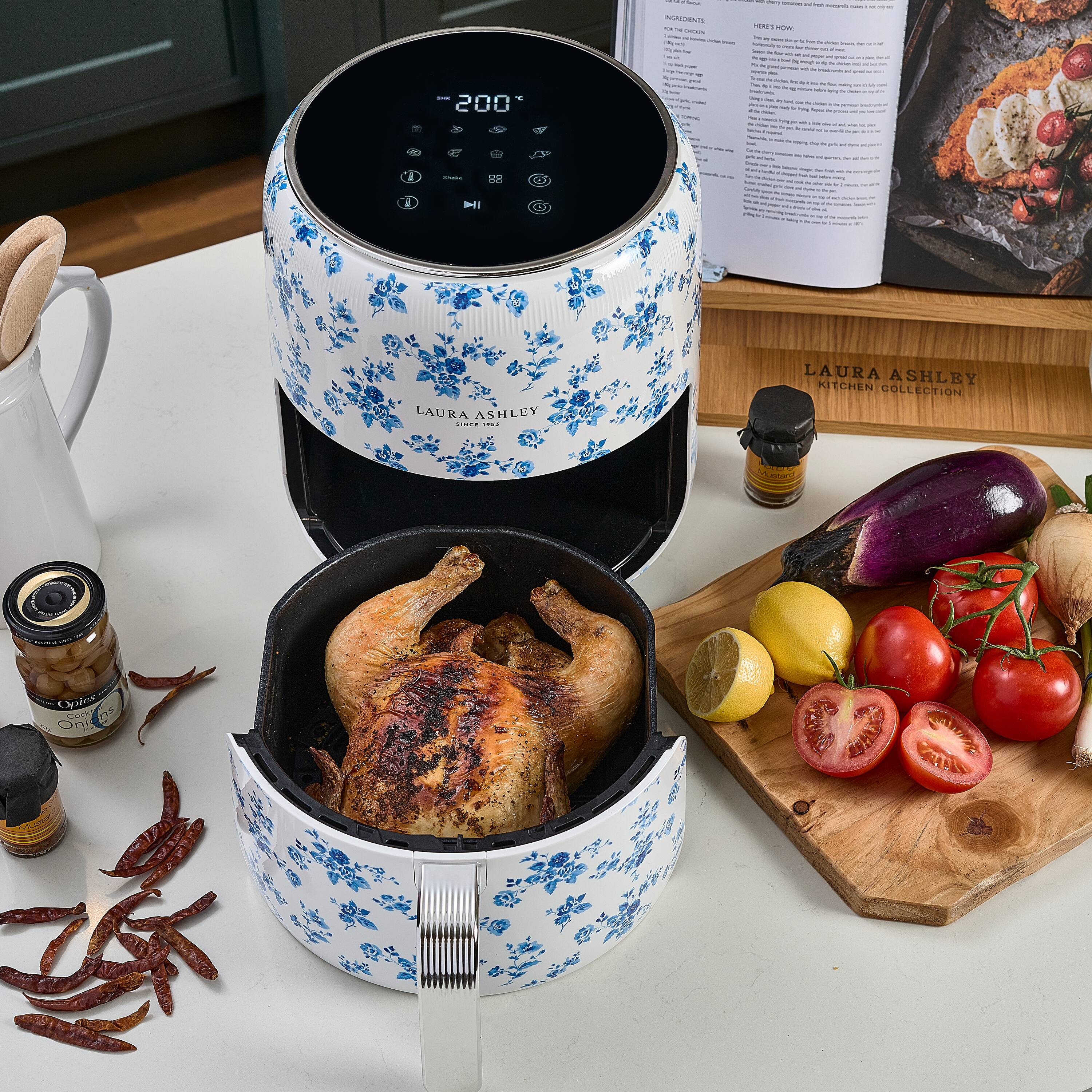 LAURA ASHLEY KITCHEN COLLECTION

200°C

Ingredients:
- 1 whole chicken
- 2 lemons
- 1 onion
- 2 garlic cloves
- 1 tsp dried oregano
- 1 tsp dried thyme
- Salt and pepper
- 2 tbsp olive oil

Preheat the oven to 200°C.

Heat the oil in a large skillet over medium heat. Add the chicken and cook until browned on all sides. Transfer the chicken to a roasting pan. Add the lemon halves, onion, garlic, oregano, thyme, salt, and pepper. Roast for about 1 hour, or until the chicken is cooked through.