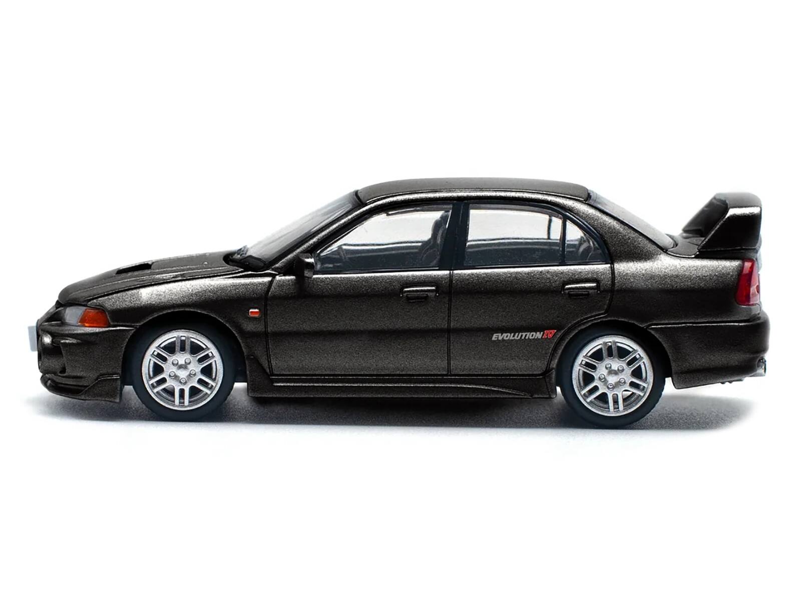 Left. Pop Race - Mitsubishi Lancer Evolution IV RHD (Right Hand Drive) Pyrenees Black Pearl 1/64 Diecast Model Car by Pop Race - Black Pearl.