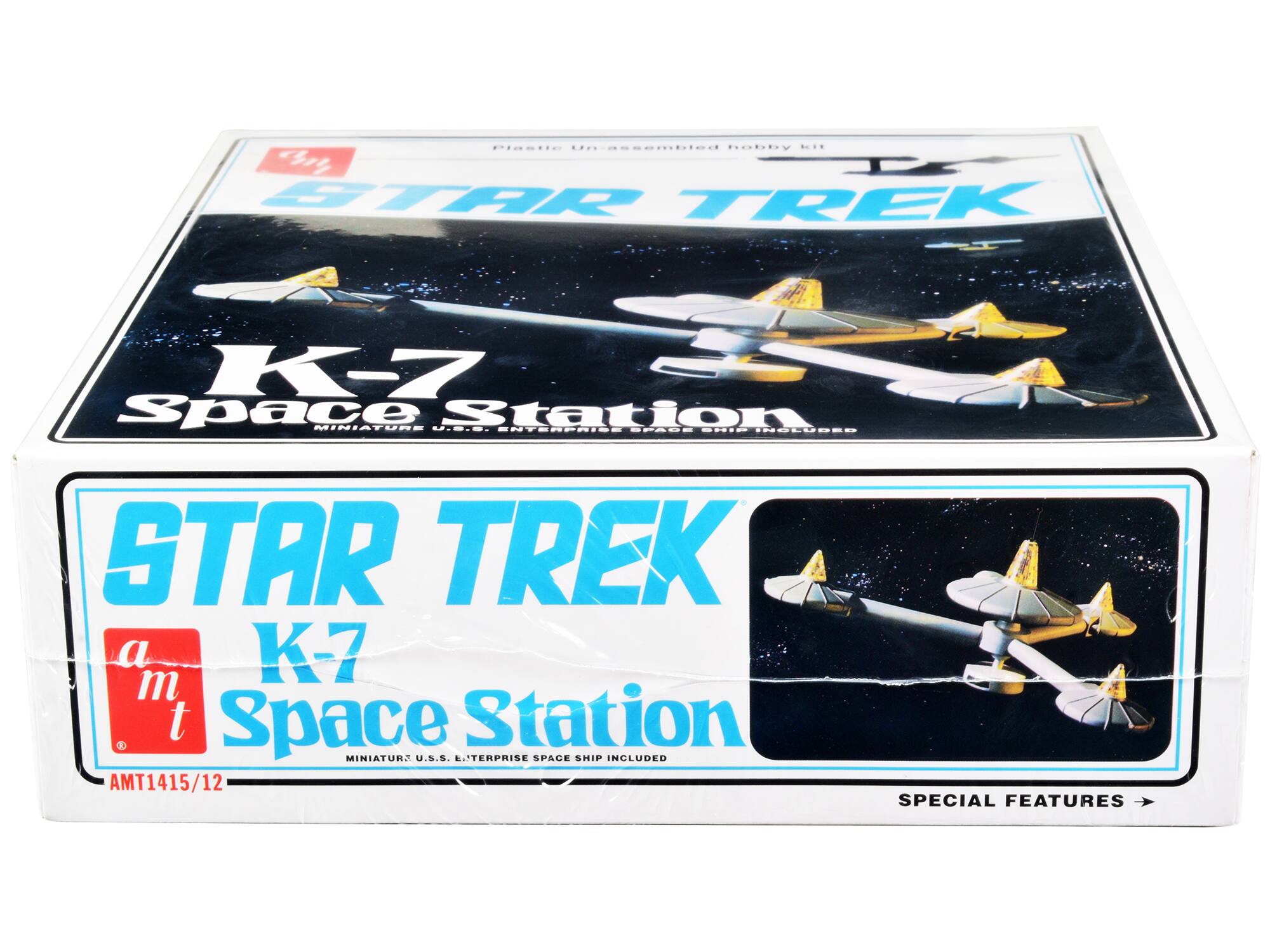 Sure, here is the corrected and grouped text from the image:

---

**STAR TREK**

**K-7 Space Station**

MINIATURE U.S.S. ENTERPRISE SPACE SHIP INCLUDED

---

**Plastic Un-assembled hobby kit**

---

**a m t**

---

**AMT1415/12**

---

**SPECIAL FEATURES**