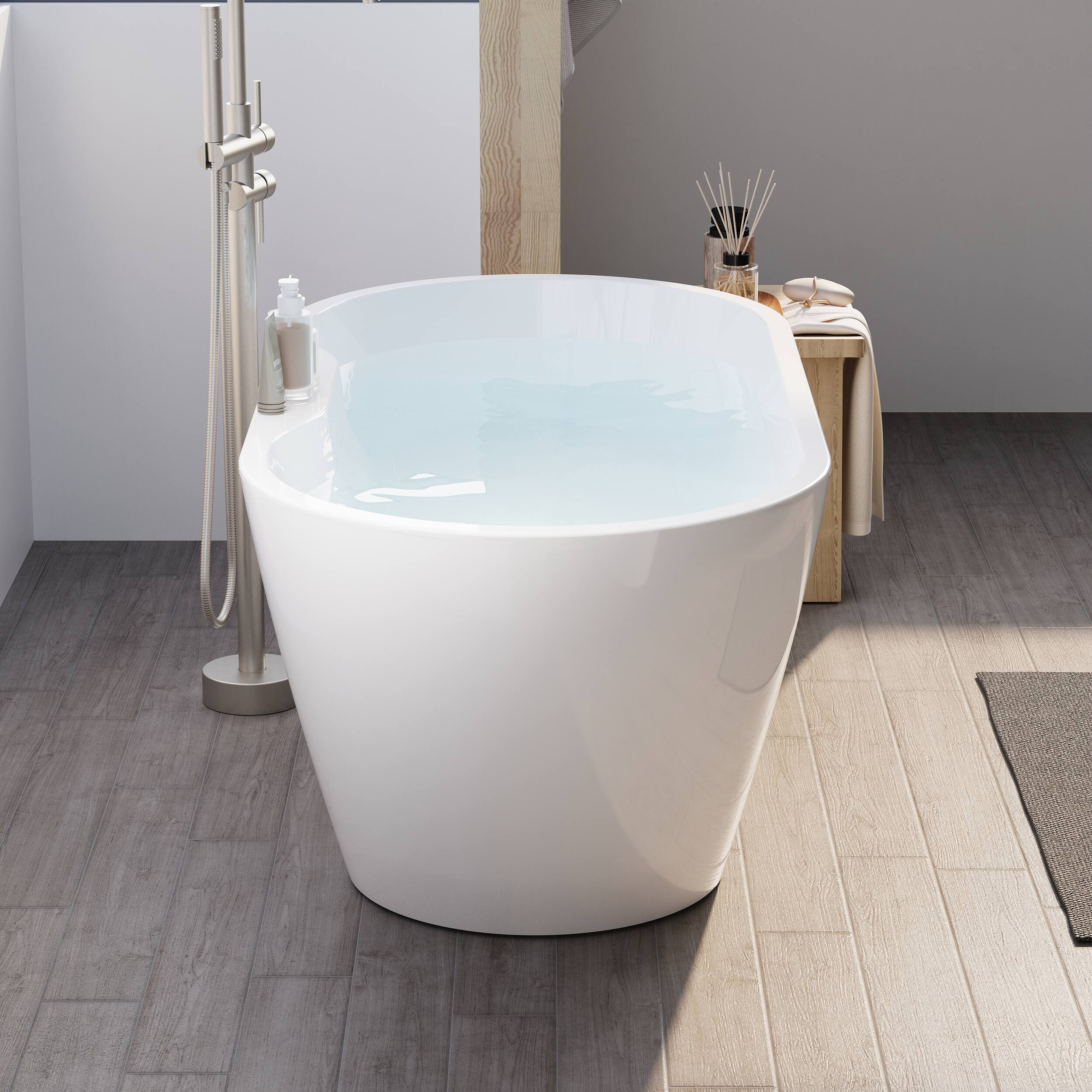 Angle. WELLFOR - Nava 57 in. x 29.5 in. Acrylic Oval Freestanding Soaking Bathtub with Center Drain and Widened Deck for Storage - White.