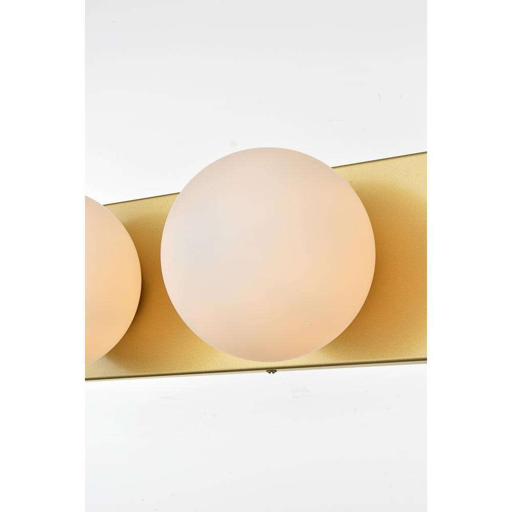 Left. Living District - Jaylin 4 light Brass and frosted white Bath Sconce - Brass And Frosted White.