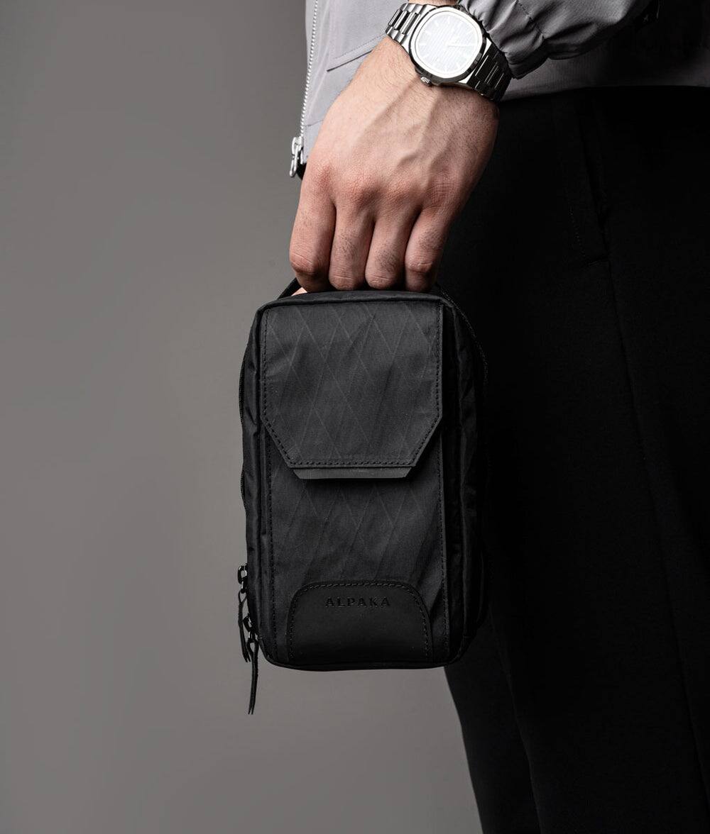 Alt View 4. ALPAKA - Modular Sling V2 MIini Sling Bag for Phone, Magnetic Quick Access, EDC Crossbody Bag with Adjustable Strap - Black X-Pac VX21.