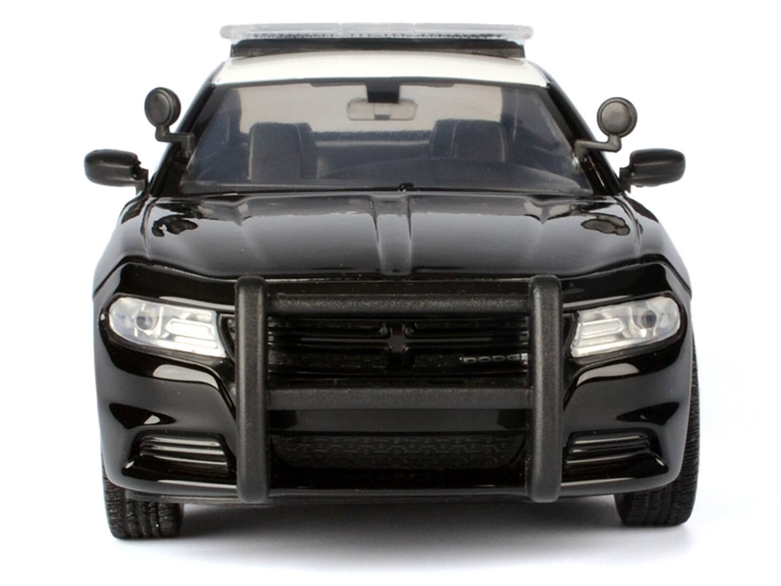 Left. Motormax - 2023 Dodge Charger Pursuit Police Car California Highway Patrol Black White Law Enforcement Public Service 1/24 - Black and White.