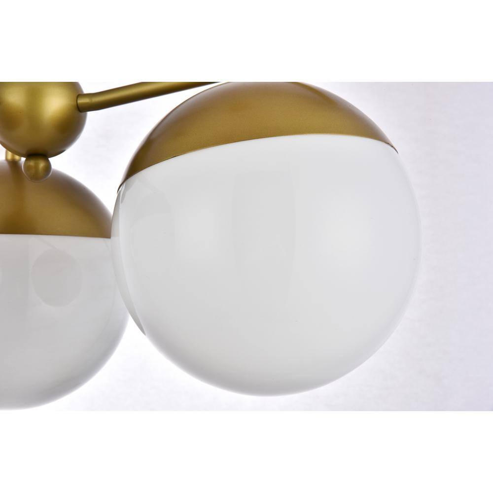 Left. Living District - Eclipse 3 Lights Brass Pendant With Frosted White Glass - Brass And Frosted White.