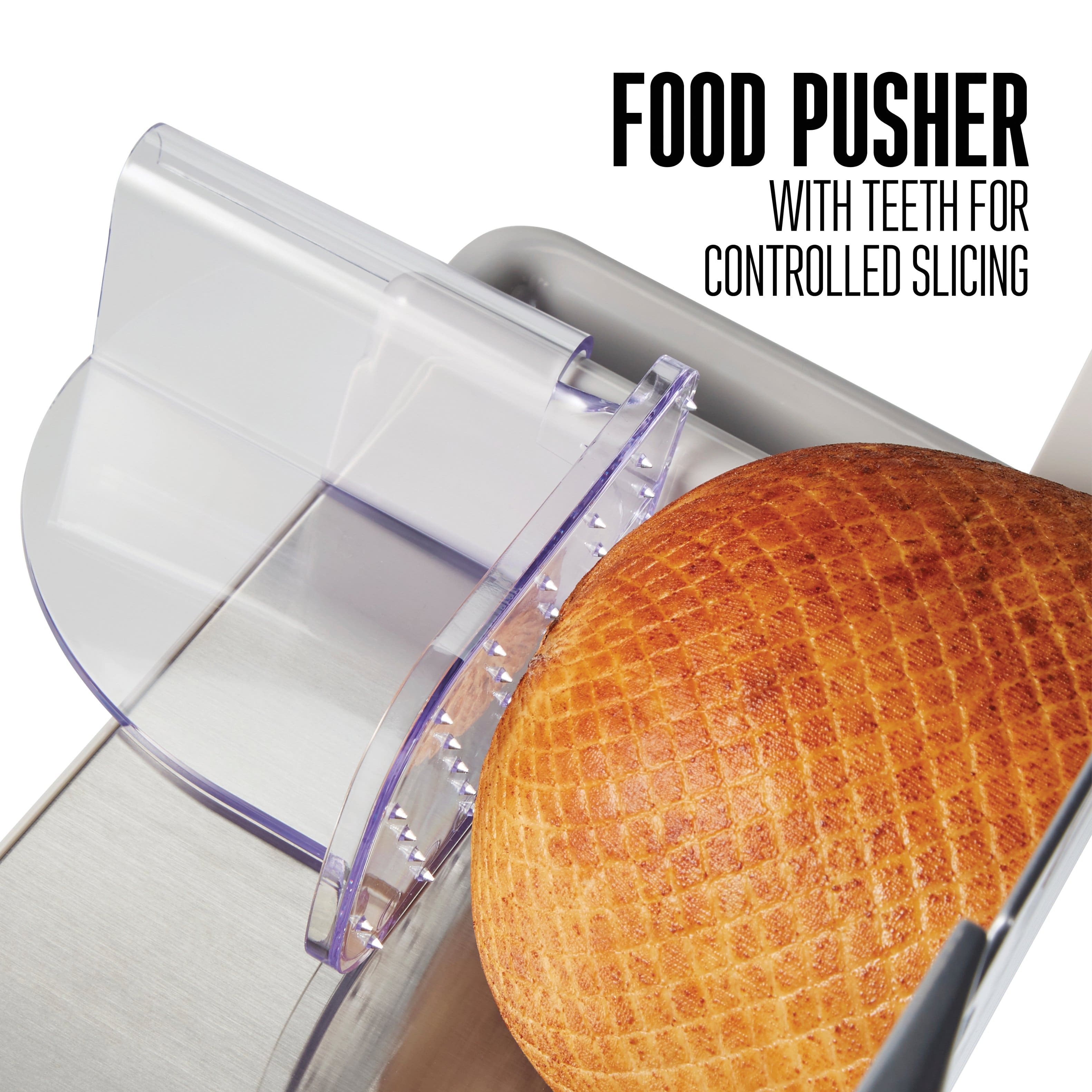 FOOD PUSHER
WITH TEETH FOR CONTROLLED SLICING