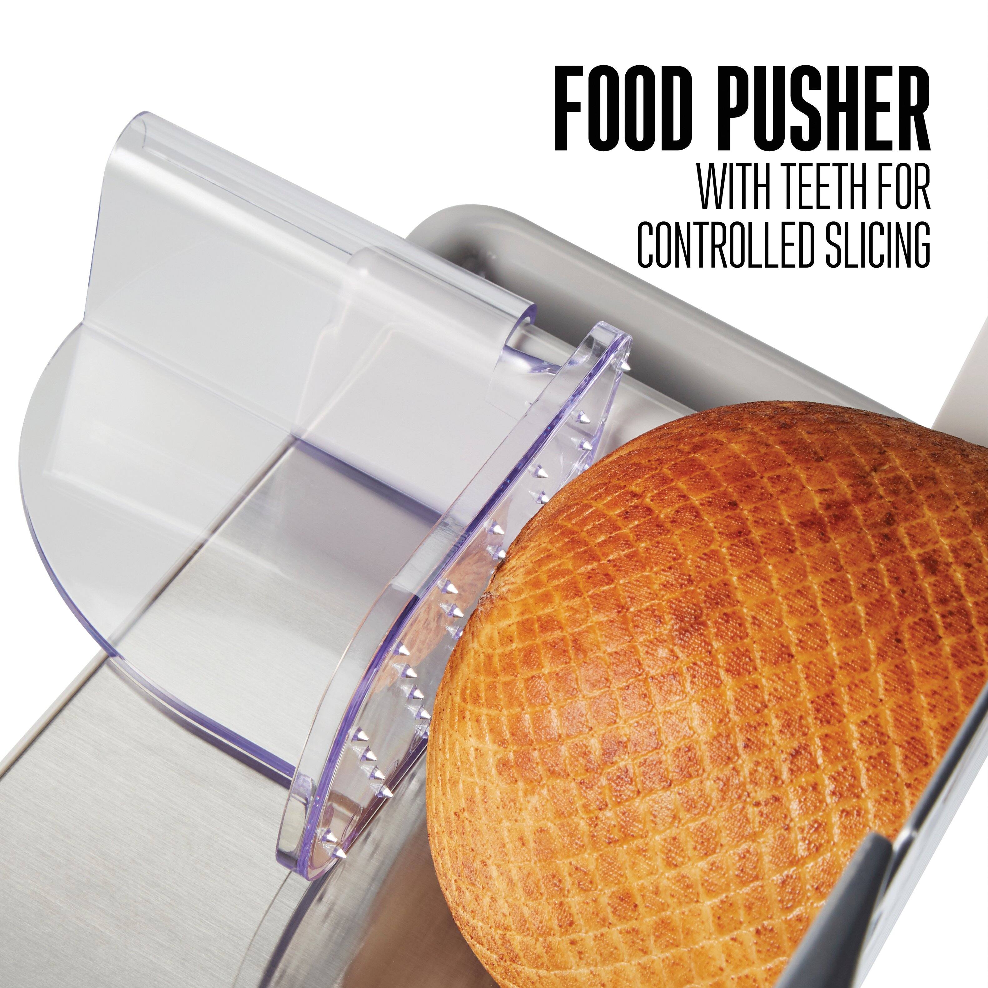 FOOD PUSHER  
WITH TEETH FOR CONTROLLED SLICING