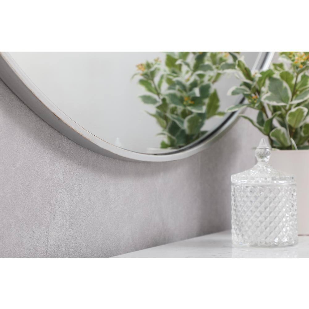Left. Elegant Decor - Metal frame round mirror 39 inch in silver - Silver.