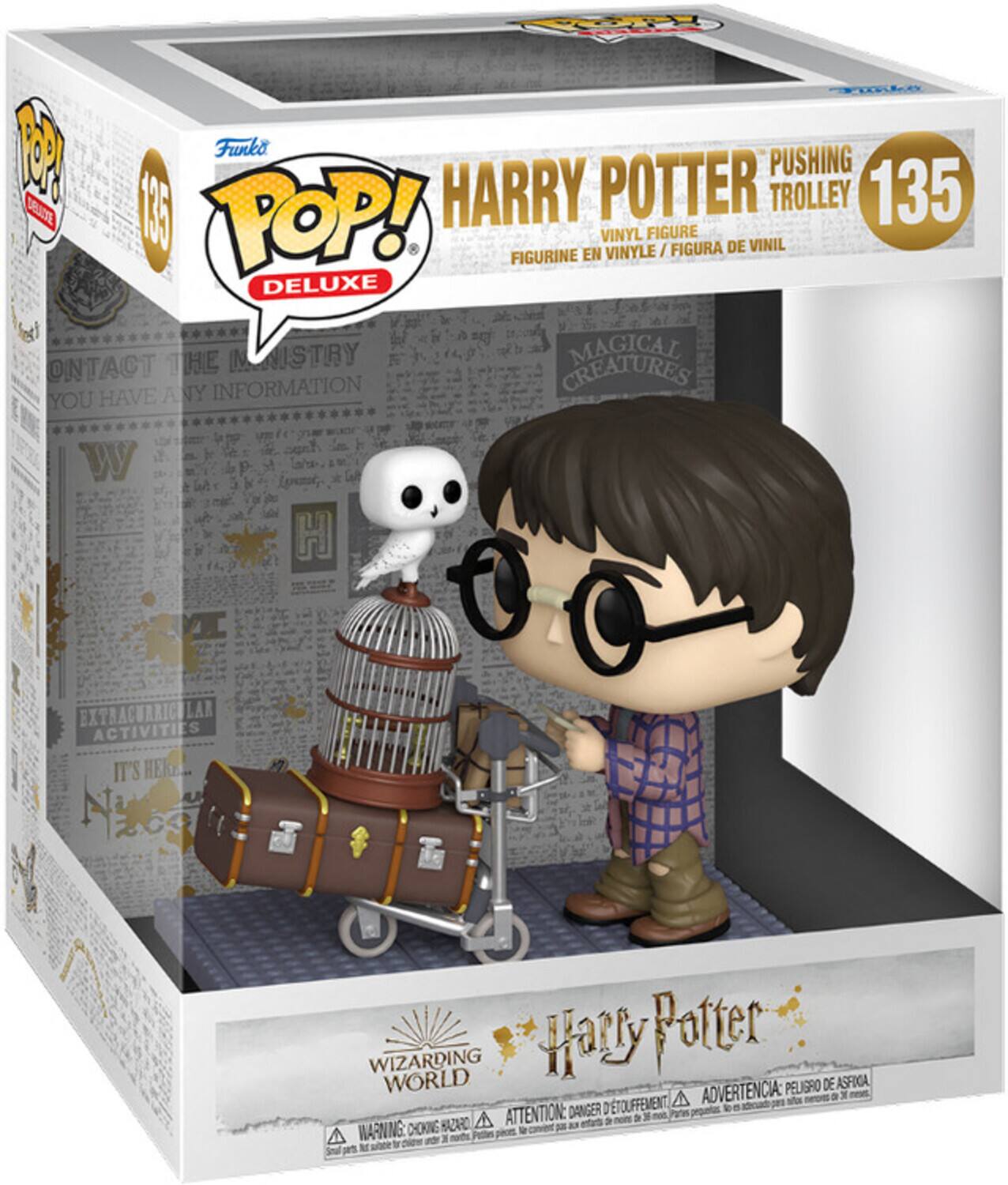 Sure, here is the corrected and grouped text from the image:

---

**Funko POP! Deluxe**

**HARRY POTTER PUSHING TROLLEY**

**VINYL FIGURE / FIGURINE EN VINYLE / FIGURA DE VINIL**

**135**

**MAGICAL CREATURES**

**WIZARDING WORLD**

**WARNING: CHOKING HAZARD - Small parts. Not for children under 3 years.**

**ADVERTENCIA: PELIGRO DE ASPÍRAL - Piezas pequeñas. No es adecuado para niños menores de 3 años.**

**ATTENTION: DANGER D'ETOUFFEMENT - Petites pièces. Ne convient pas aux enfants de moins de 3 ans.**

**CONTACT THE MINISTRY IF YOU HAVE ANY INFORMATION**

**EXTRACURRICULAR ACTIVITIES**

**IT'S HERE**

**Harry Potter**

---

This text is organized as it appears on the packaging.