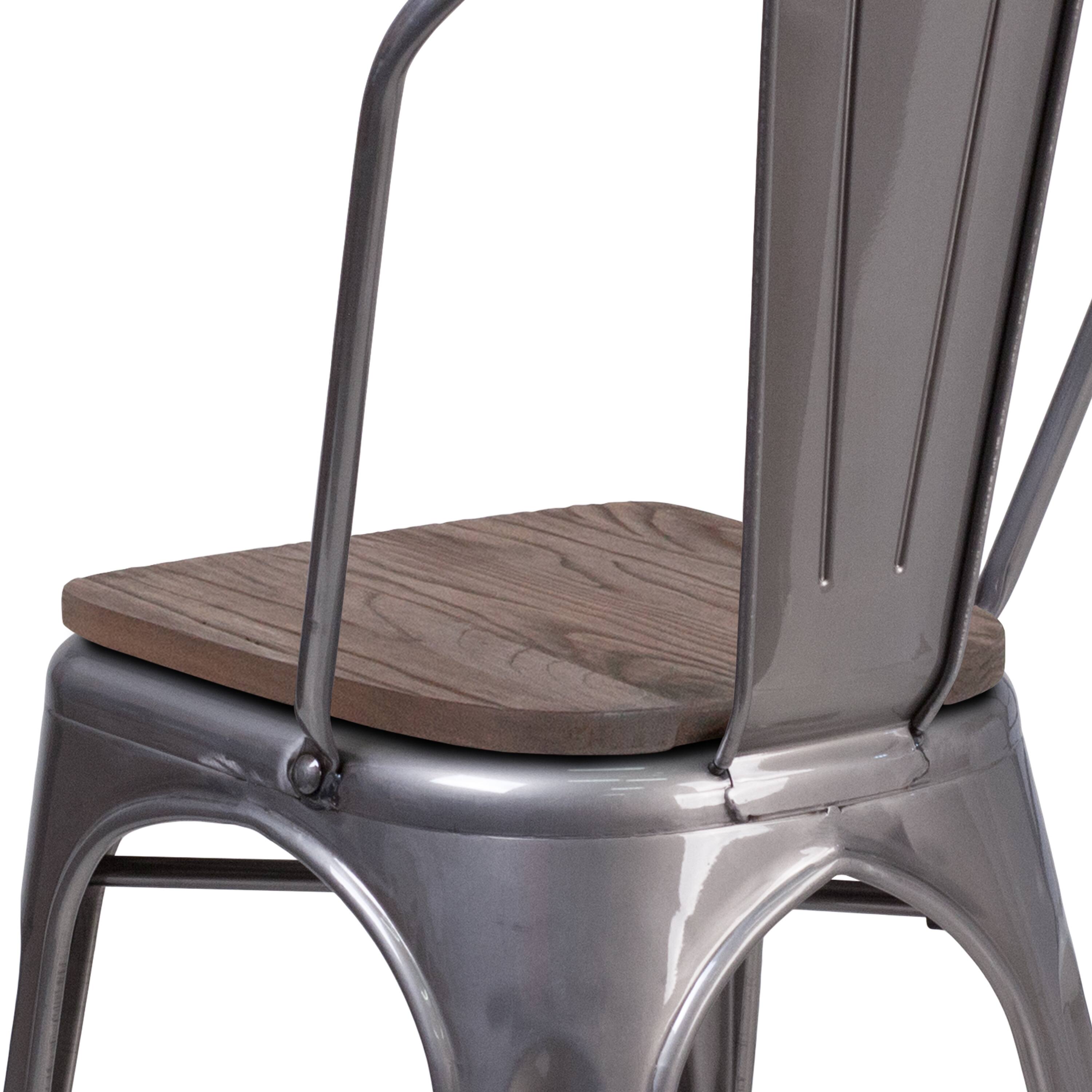 Alt View 2. Emma + Oliver - 4 Pack Metal Stackable Chair with Wood Seat - Clear Coated.