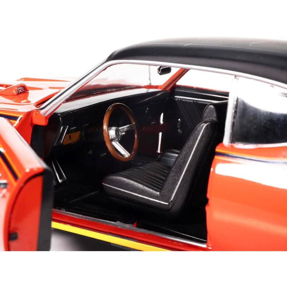 Back. Autoworld - 1969 Pontiac GTO Judge Carousel Red Black Stripes Vinyl Top "Mecum Auctions" "American Muscle" 1/18 Scale - Red with Black.