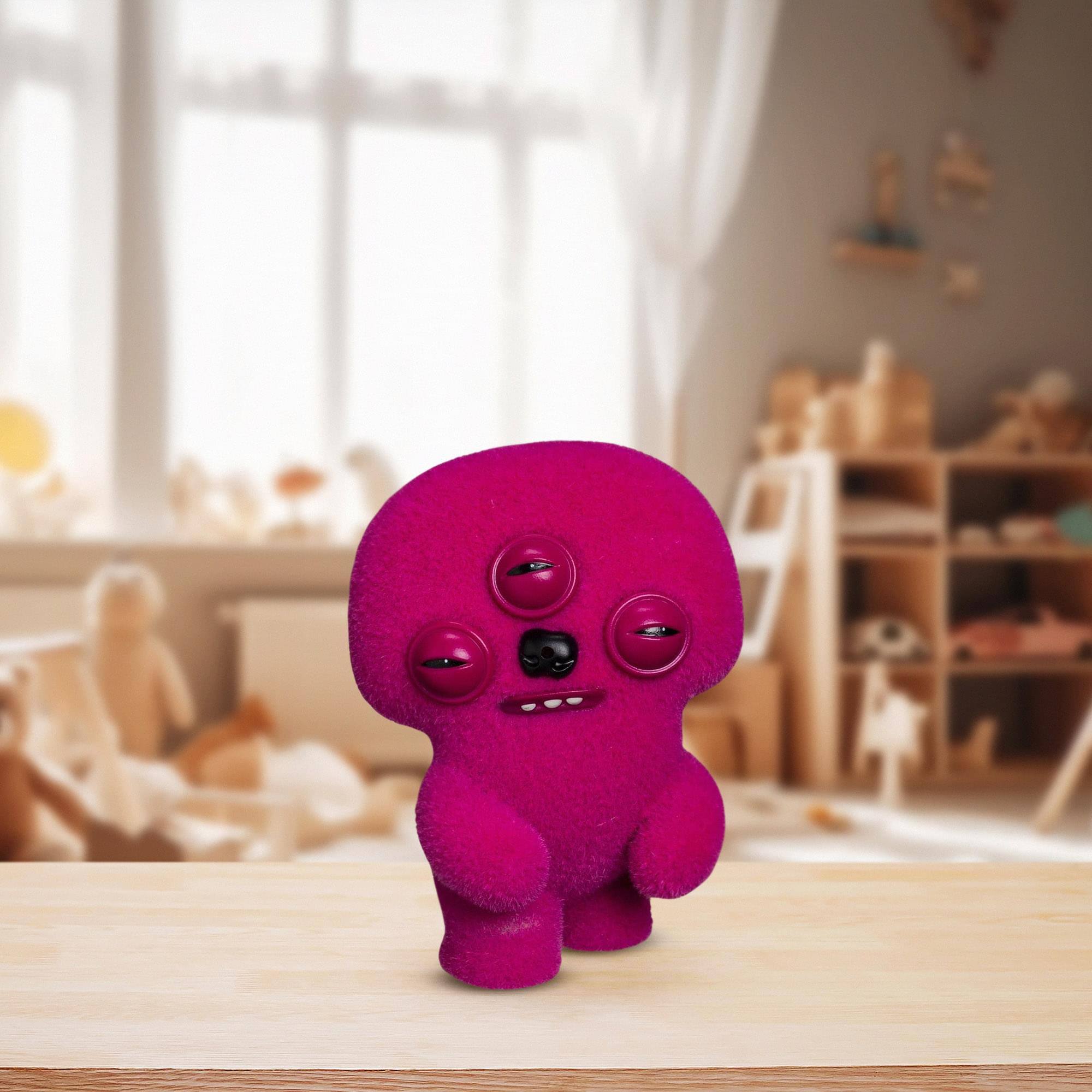 Alt View 3. ZURU - Fuggler Farting 3.5 Inch Vinyl Figure | Dark Pink Fuggler - Pink.