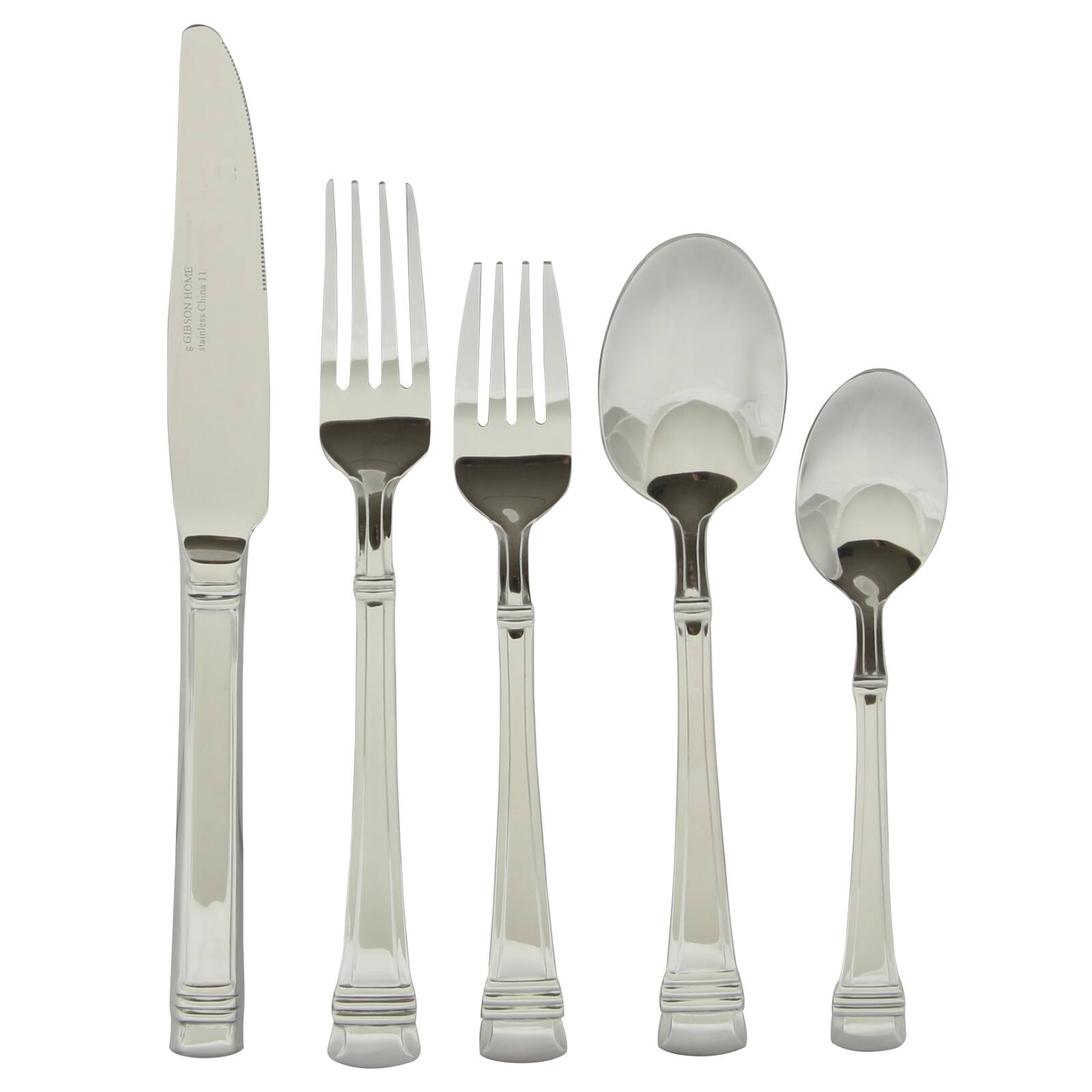 The image features a set of silverware, including a knife, fork, and spoon, all made of stainless steel. The silverware is arranged in a row, with the knife on the left, the fork in the middle, and the spoon on the right. The knife has a serrated edge, and the fork has four tines. The spoon is positioned at the end of the row, completing the set of essential tableware.
