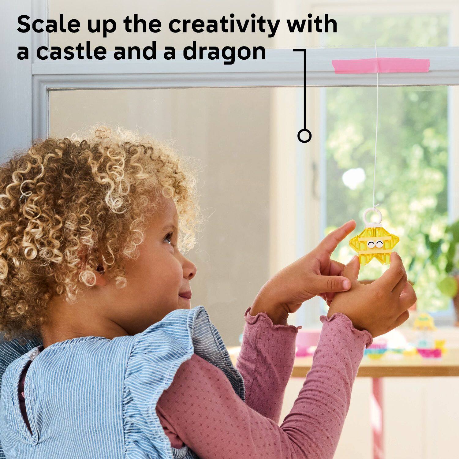 Scale up the creativity with a castle and a dragon.