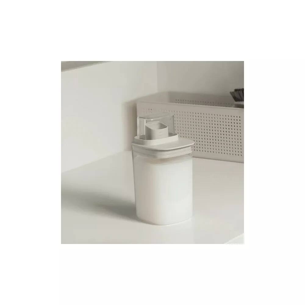 Back. OU - 34 oz Clear Laundry Detergent Dispenser with Measuring Cap, Airtight Soap & Detergent Organizer - Beige.