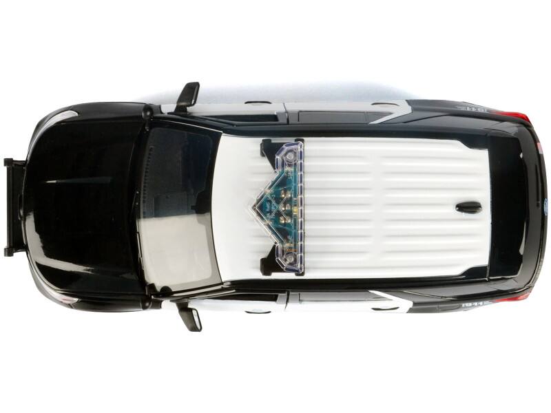Alt View 4. Motormax - 2022 Ford Police Interceptor Utility Black and White "LAPD" w/Light Bar and Lights and Sounds 1/24 Model Car by Motormax.